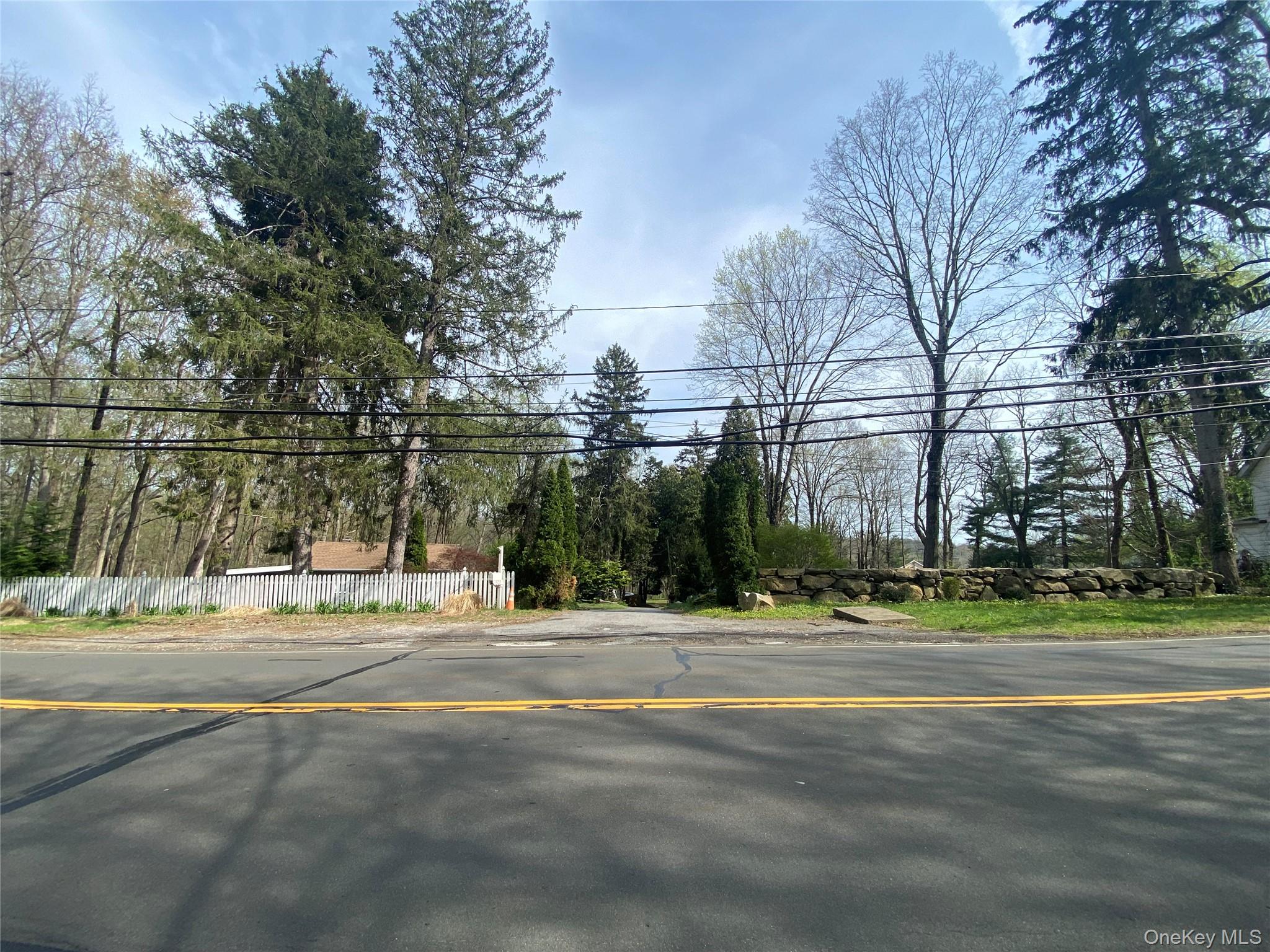 2.6-acre non-conforming commercial property located within an R-1 sing...