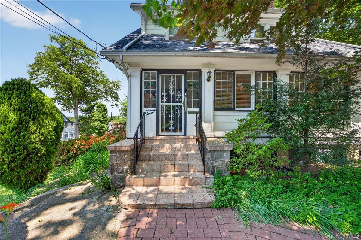 Welcome to 77 Irving Place in New Rochelle. This charming 4-bedroom, 1...