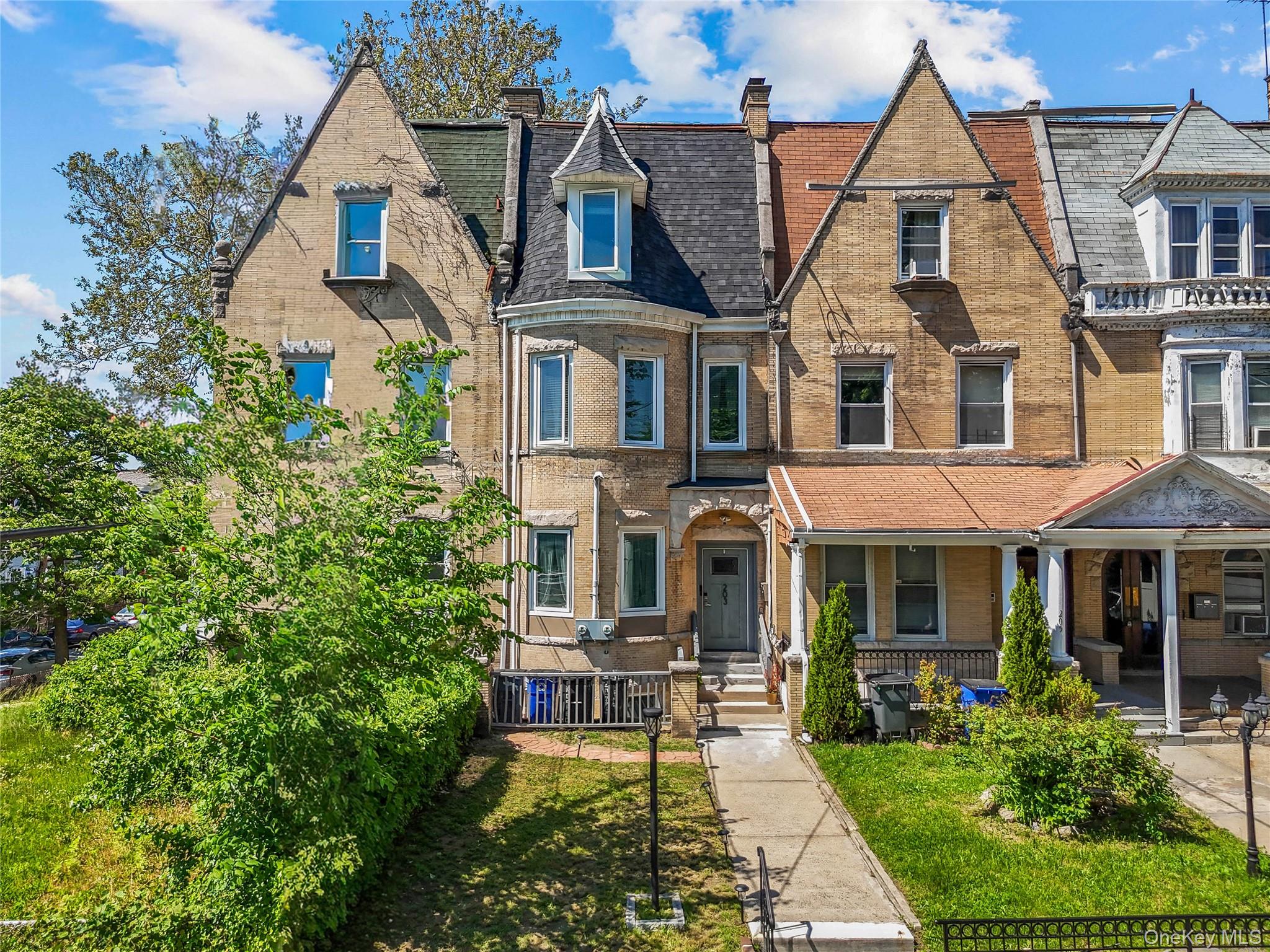 This Beautifully Renovated limestone Brick Townhouse offers a Rare Opp...