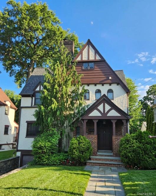 Welcome to 7 Huntwood Place, a timeless Tudor home perfectly situated...