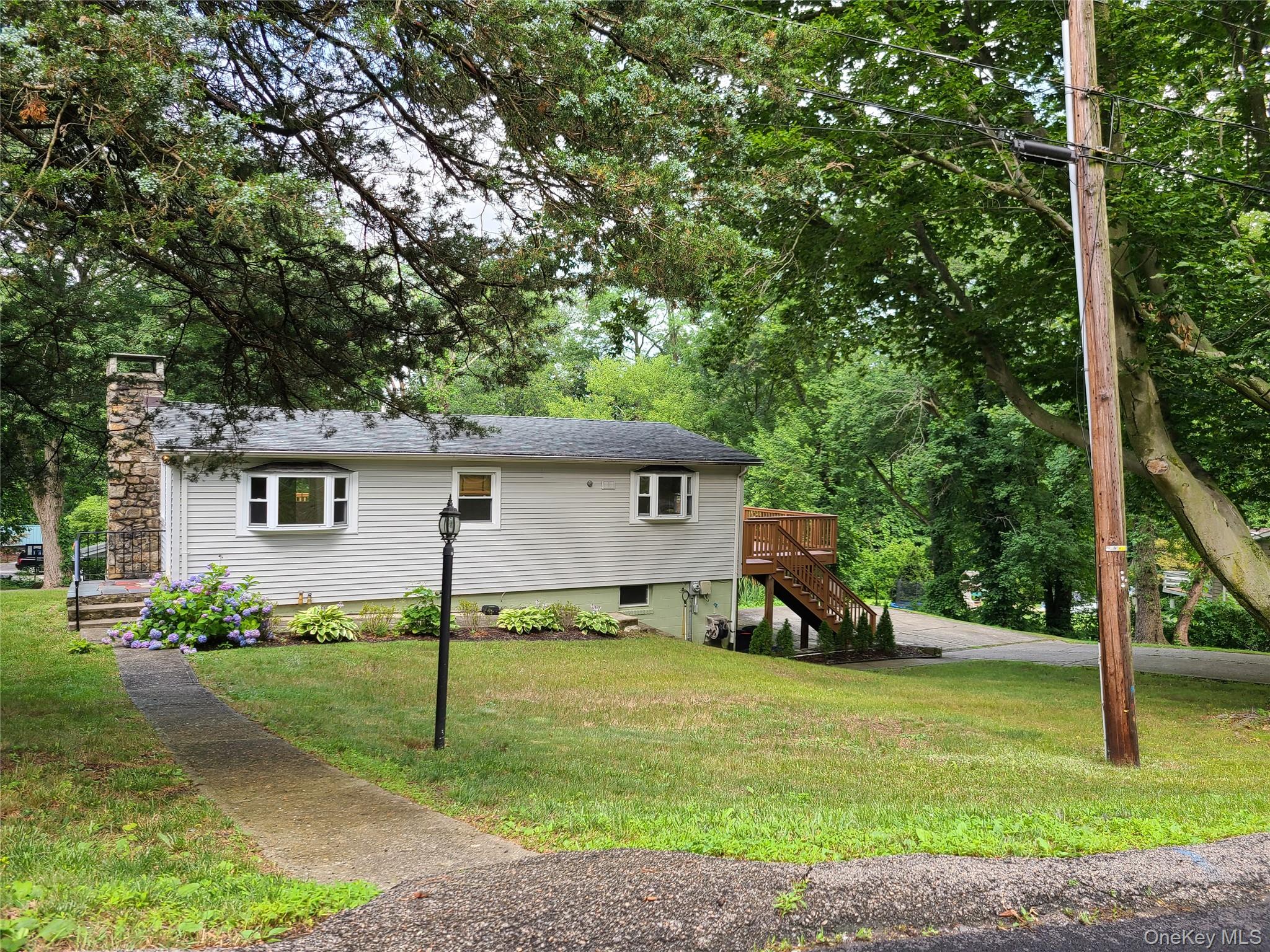 This well-maintained home offers a versatile layout with two bedrooms...