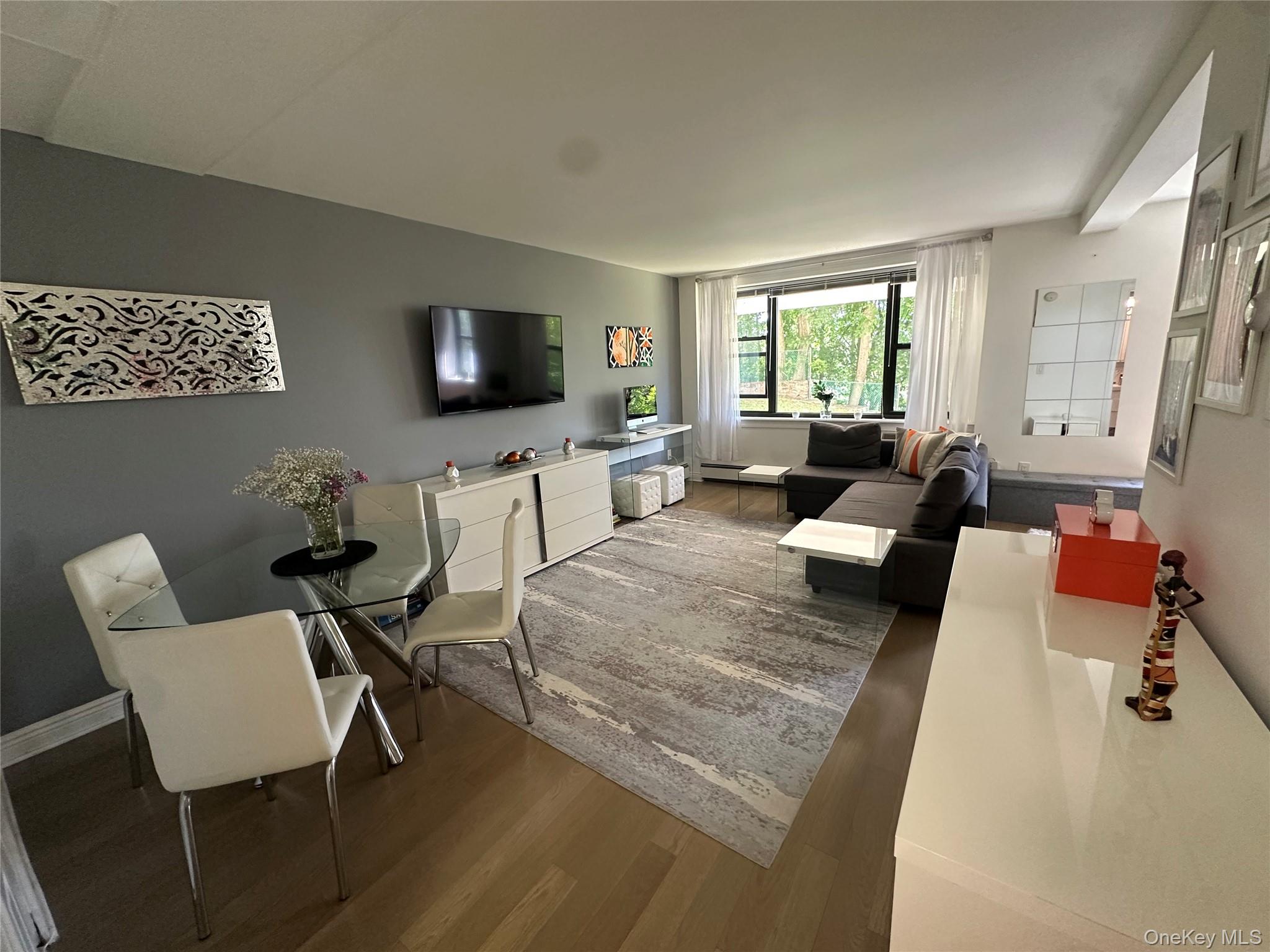 Move right into this beautifully renovated studio that lives like a on...