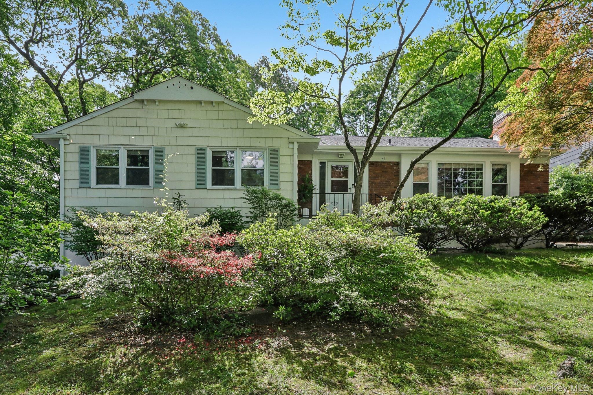 Meticulously cared for and filled with natural light, this beautifully...