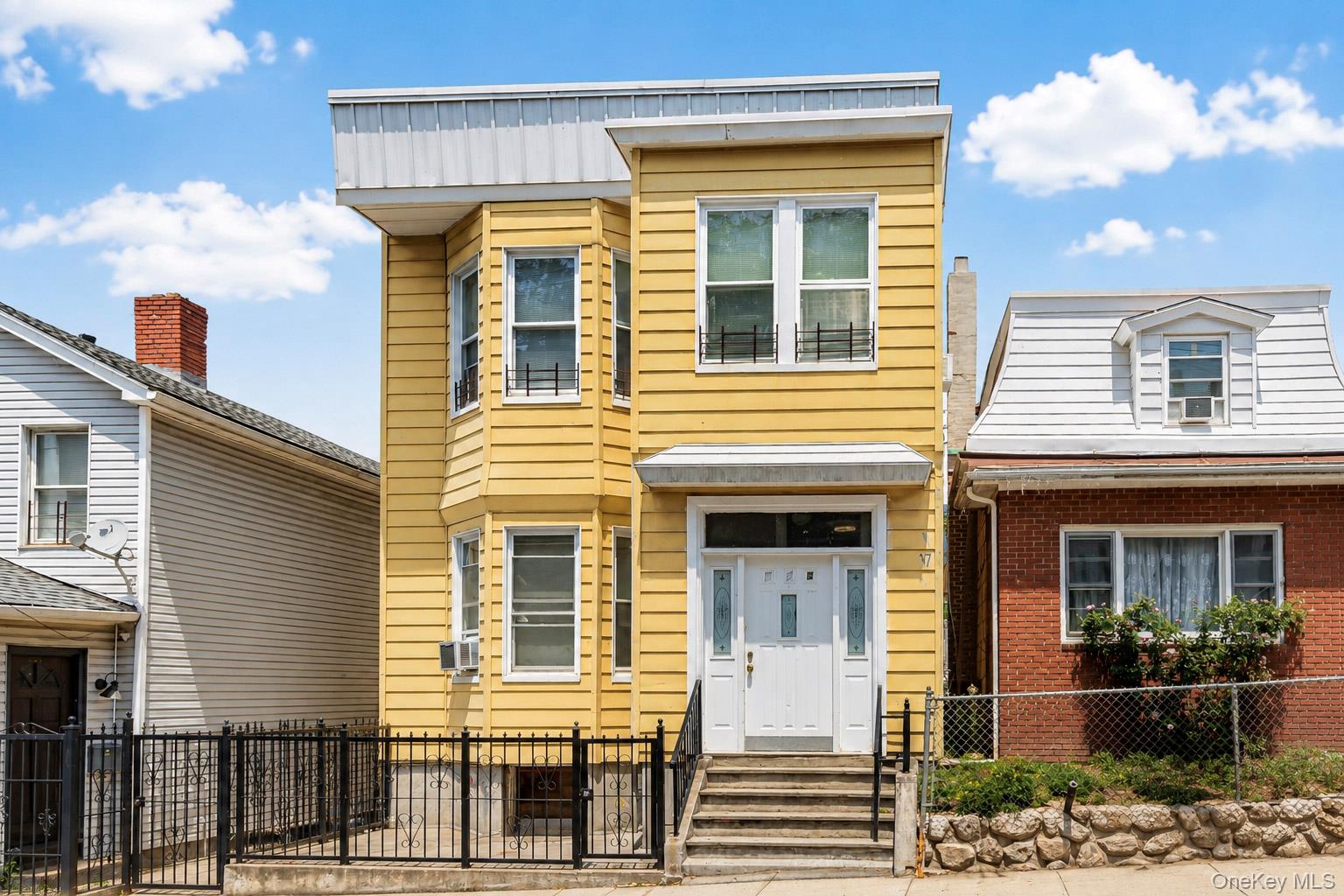 GREAT 2 FAMILY INVESTMENT PROPERTY IN MOVE IN CONDITION WITH  SOME UPD...