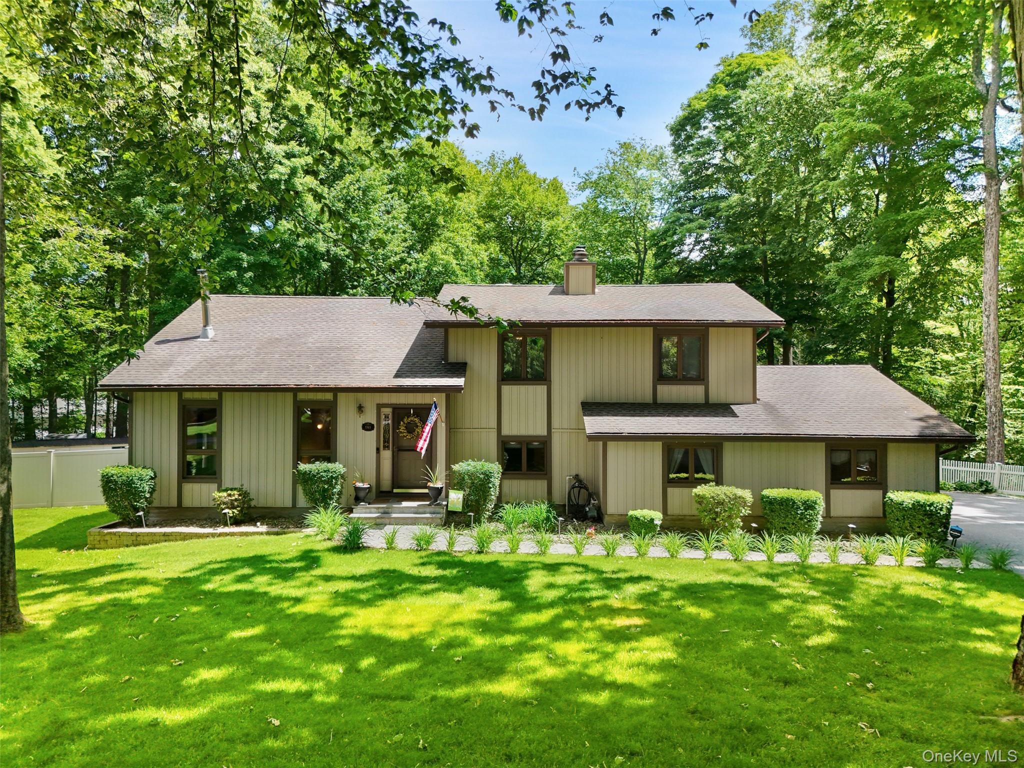 Welcome to 90 Timberlane Court! Make this lovely home with a legal two...