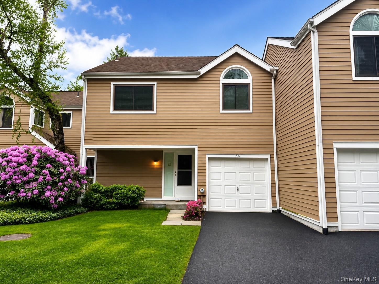 Spacious and sun drenched 3 bedroom, 2.5 bath townhouse with an attach...