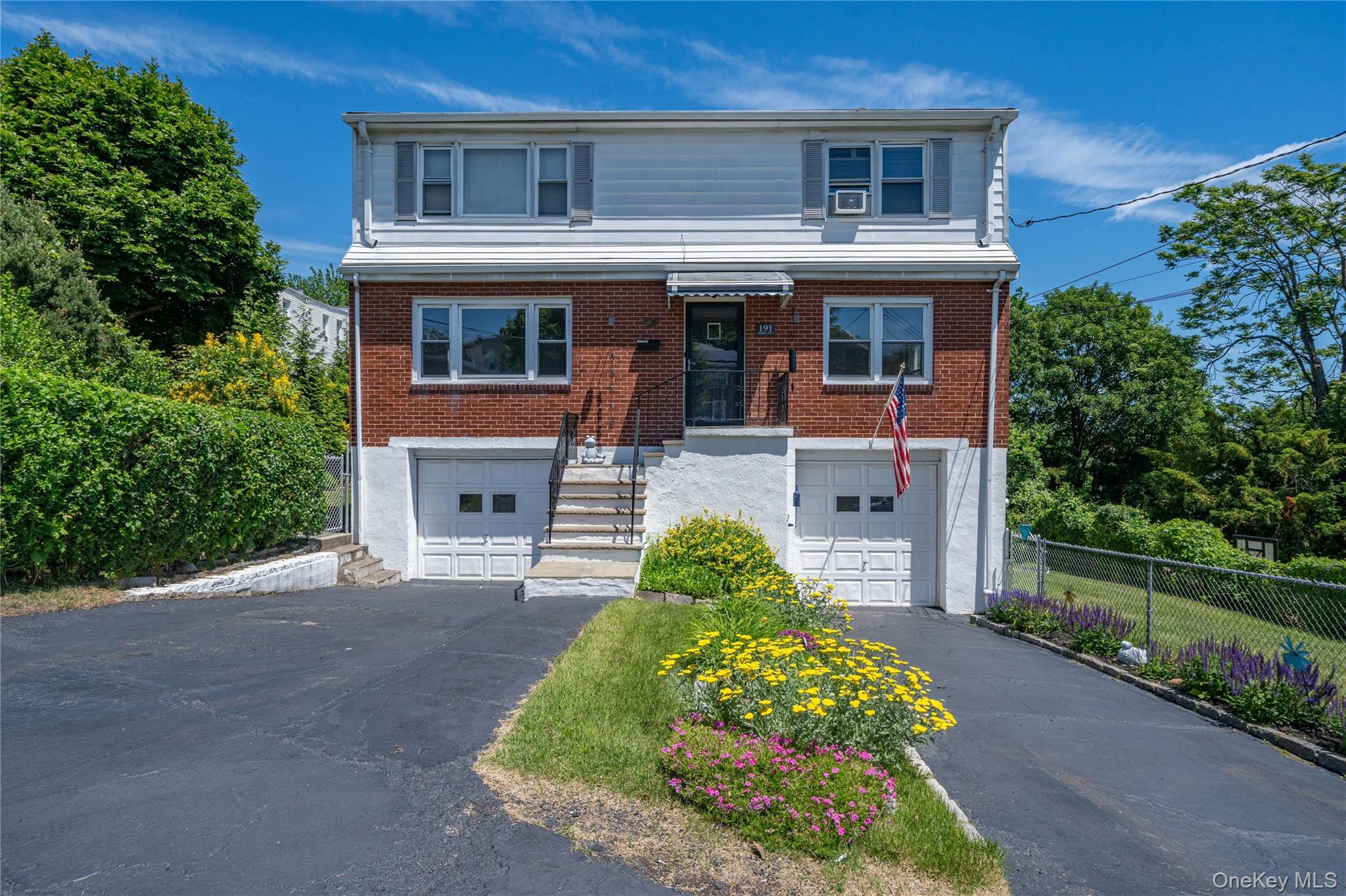 Welcome to this spacious Colonial two-family home in the hills of Yonk...