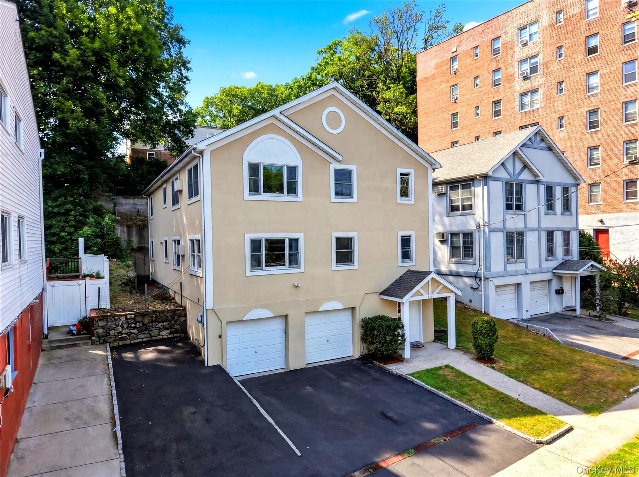 Rare opportunity to own an income-producing, modern two-family home of...