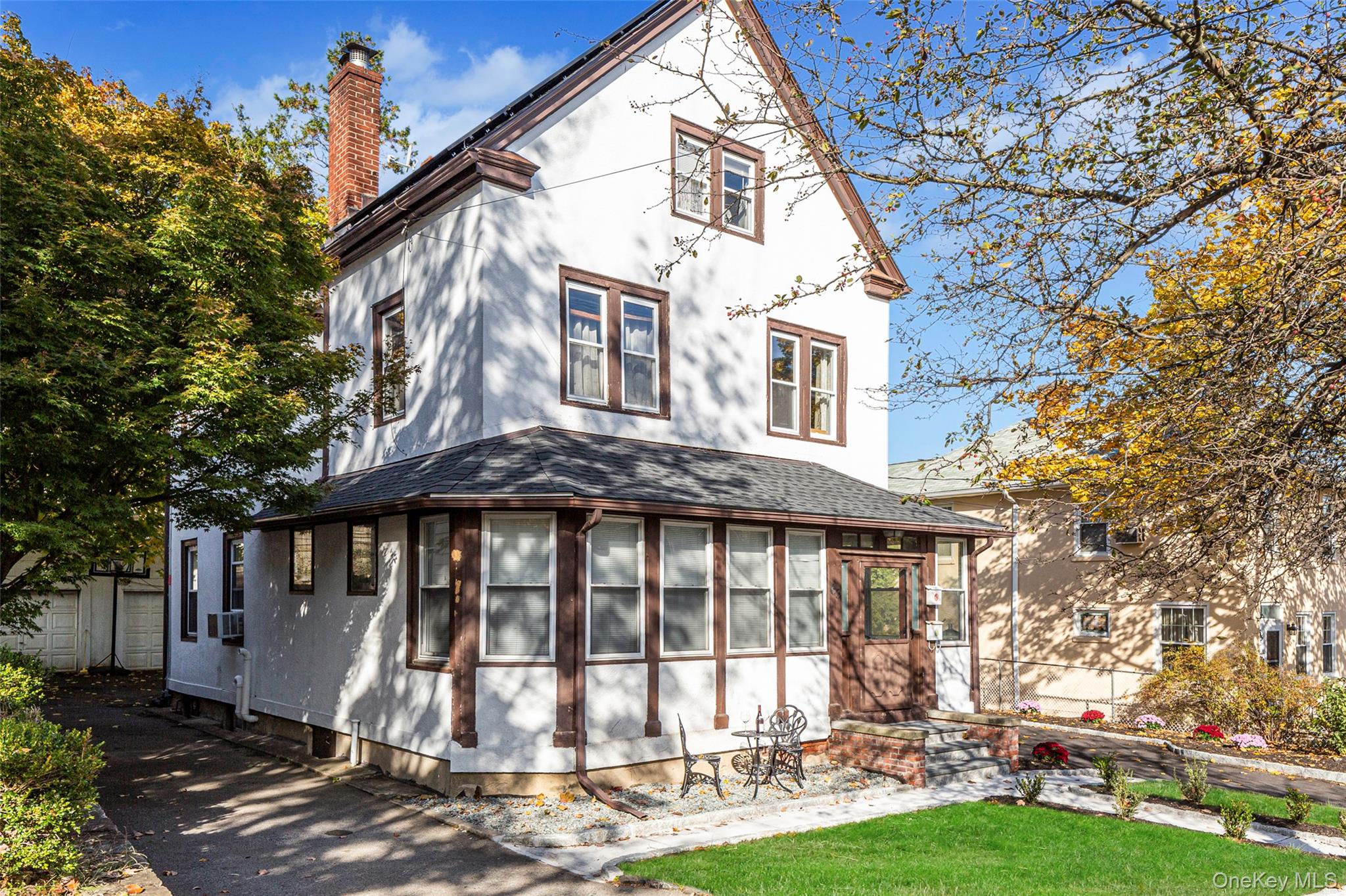 Two family investment property with plenty of parking, including two s...