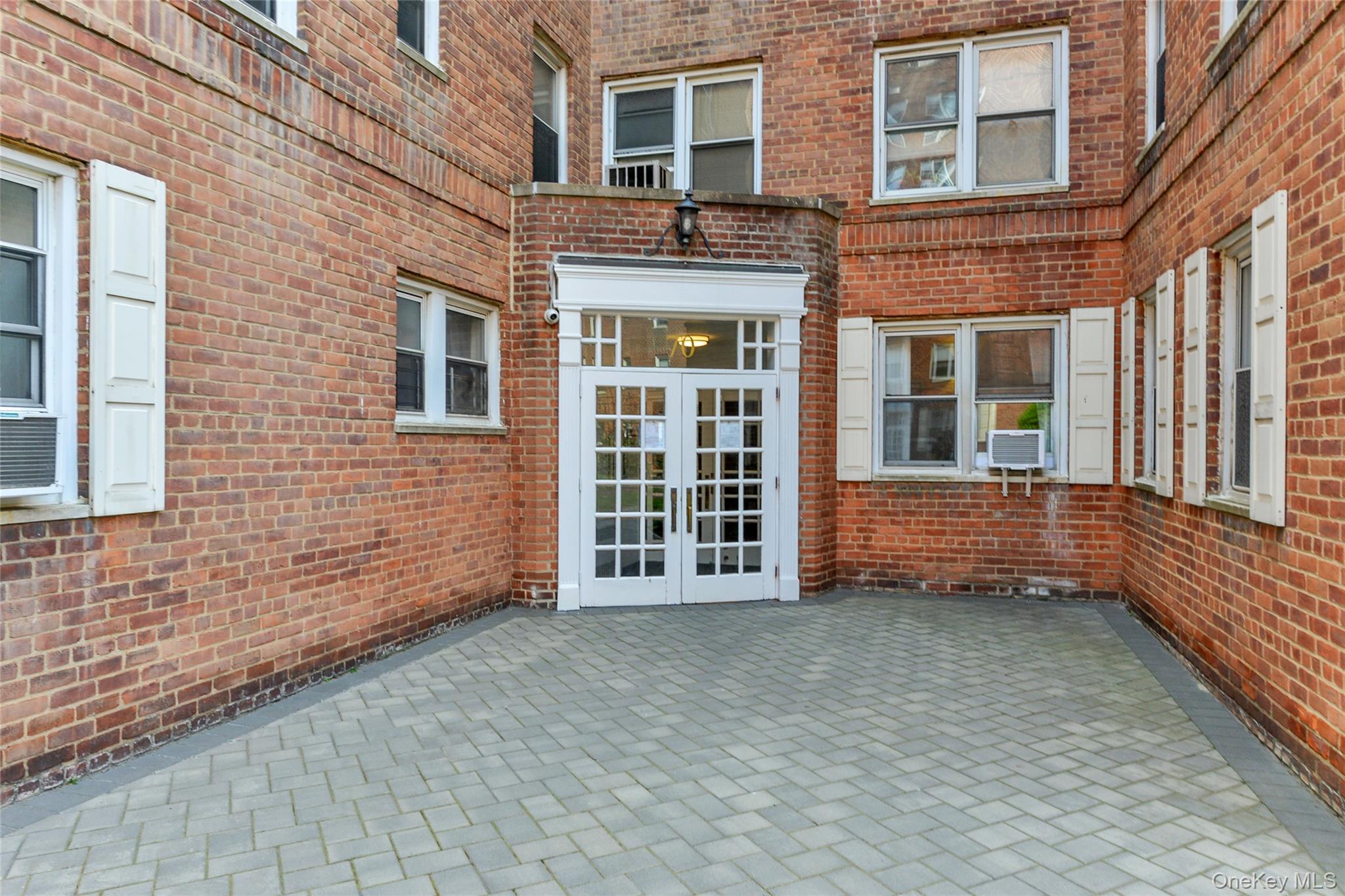 Welcome to this sunny and large 2-bedroom corner unit! Hardwood floors...