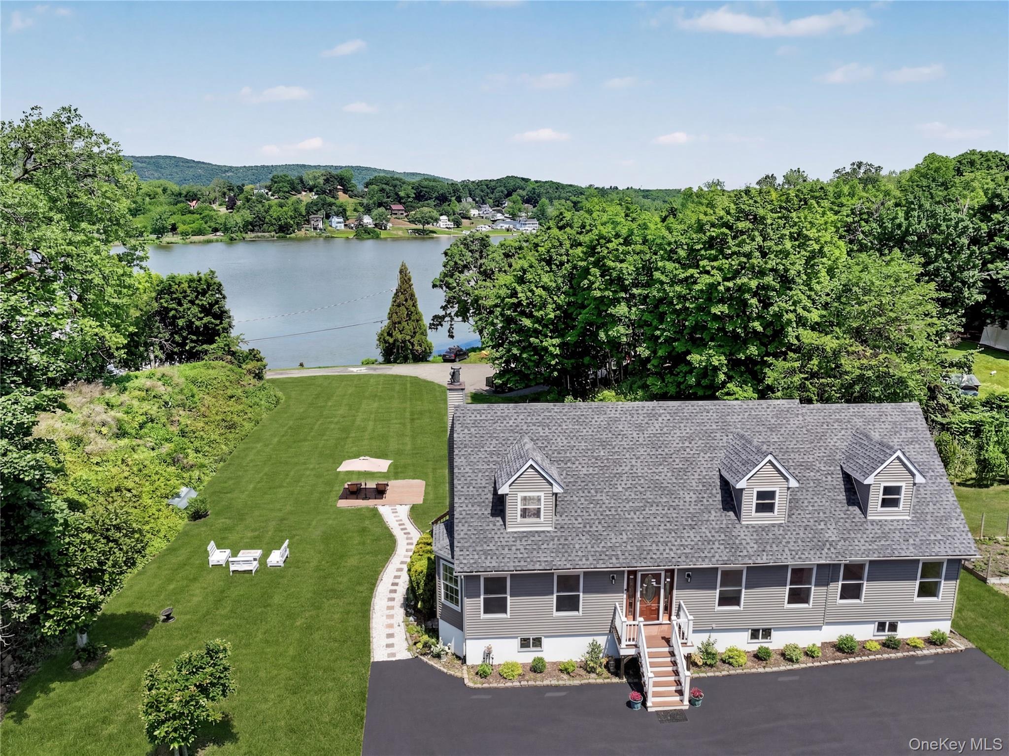 Life at 243 Kings Ferry Road is centered around the water. Launch a ka...