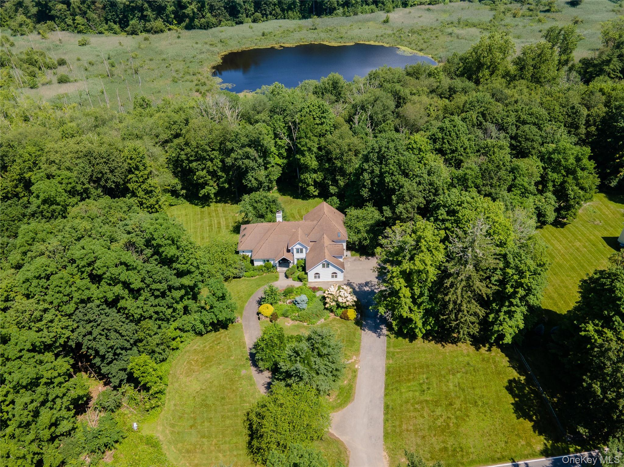 Set on 8.2 acres of pristine countryside, this custom-built 2002 resid...