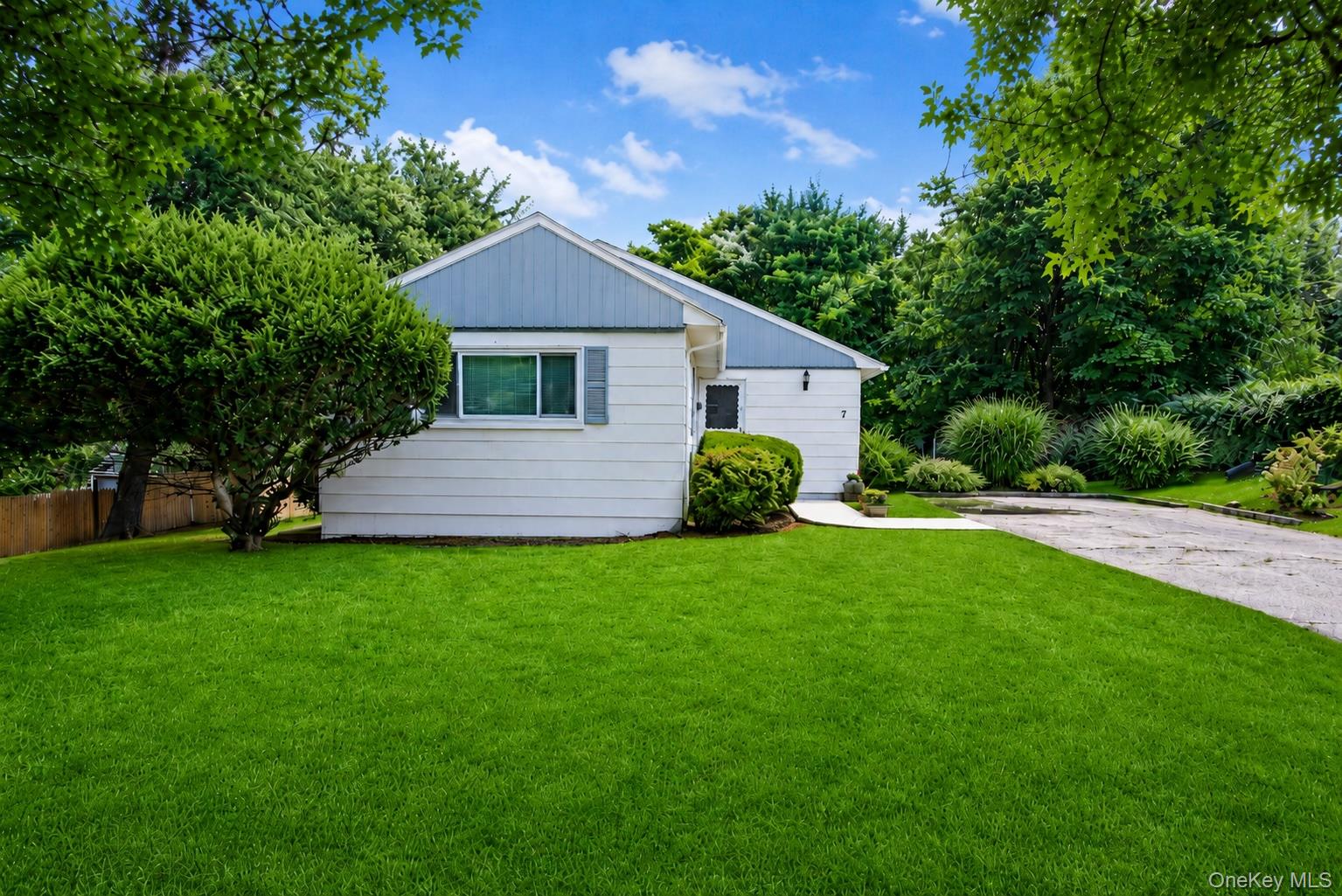 You will love the ease of one-level living in this beautifully updated...