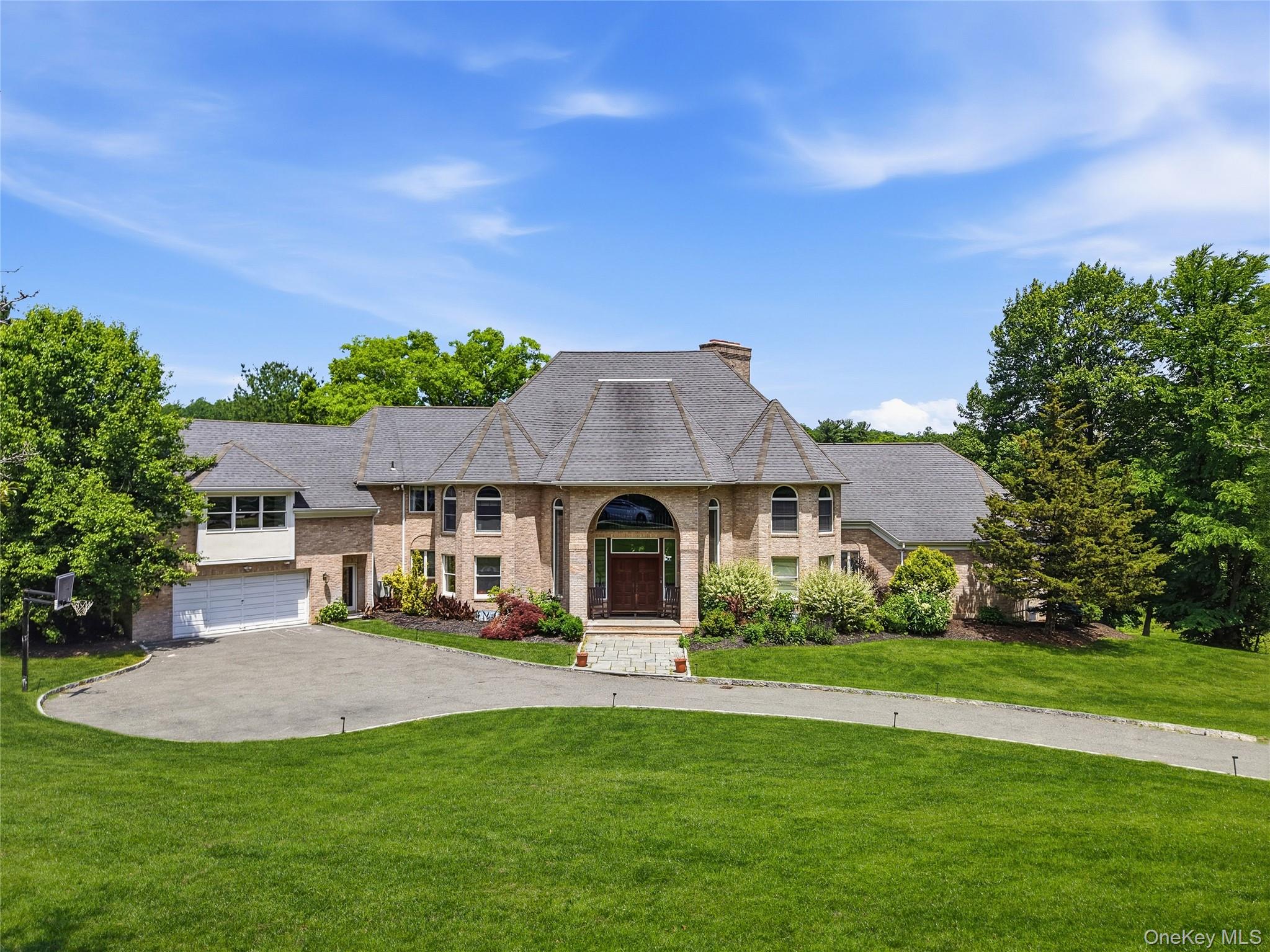 This exceptional 5-bedroom, 5.5-bathroom, 6700 sq. ft. Brick Colonial...