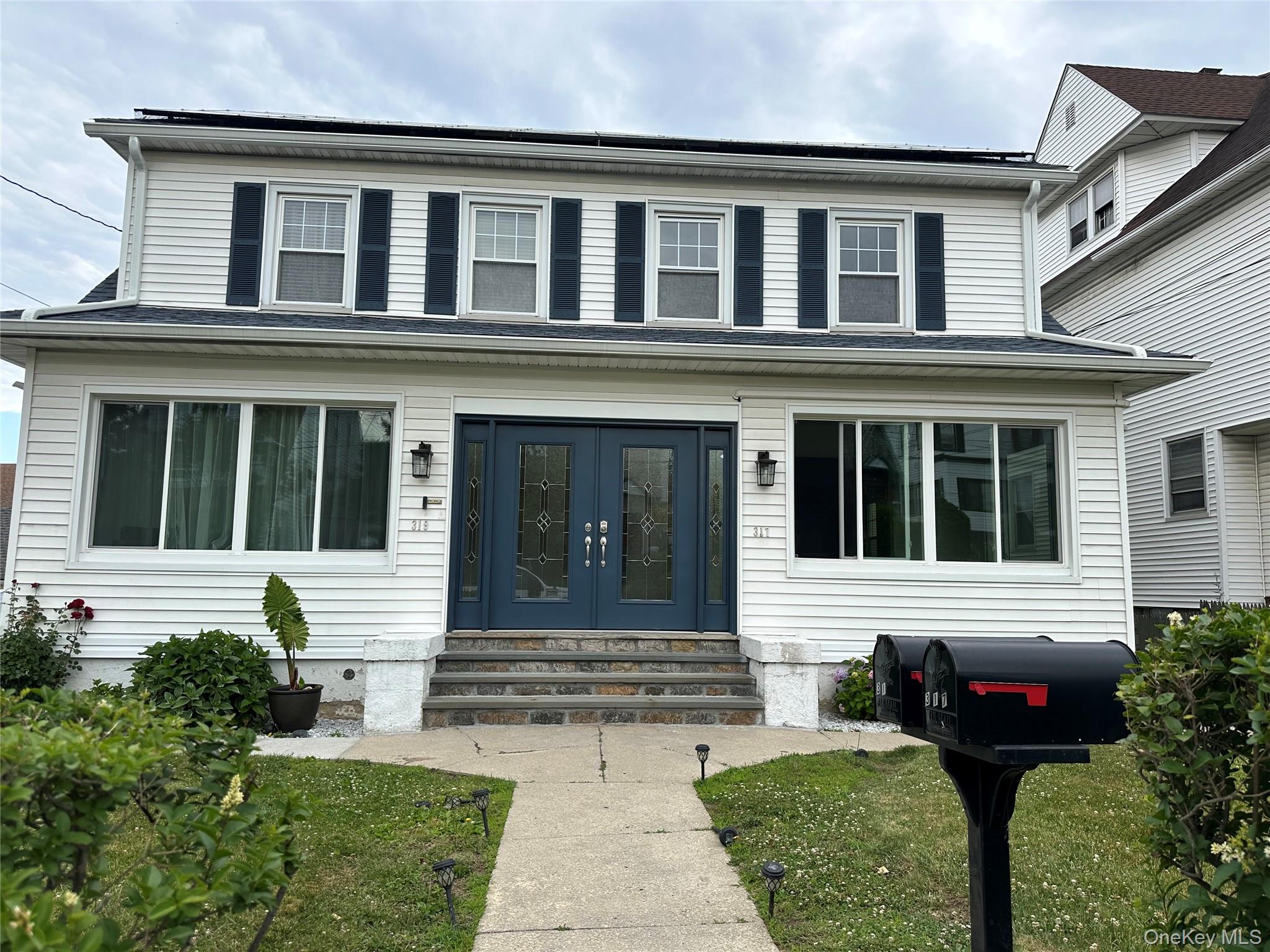 Experience true modern living in this beautifully renovated townhouse-...