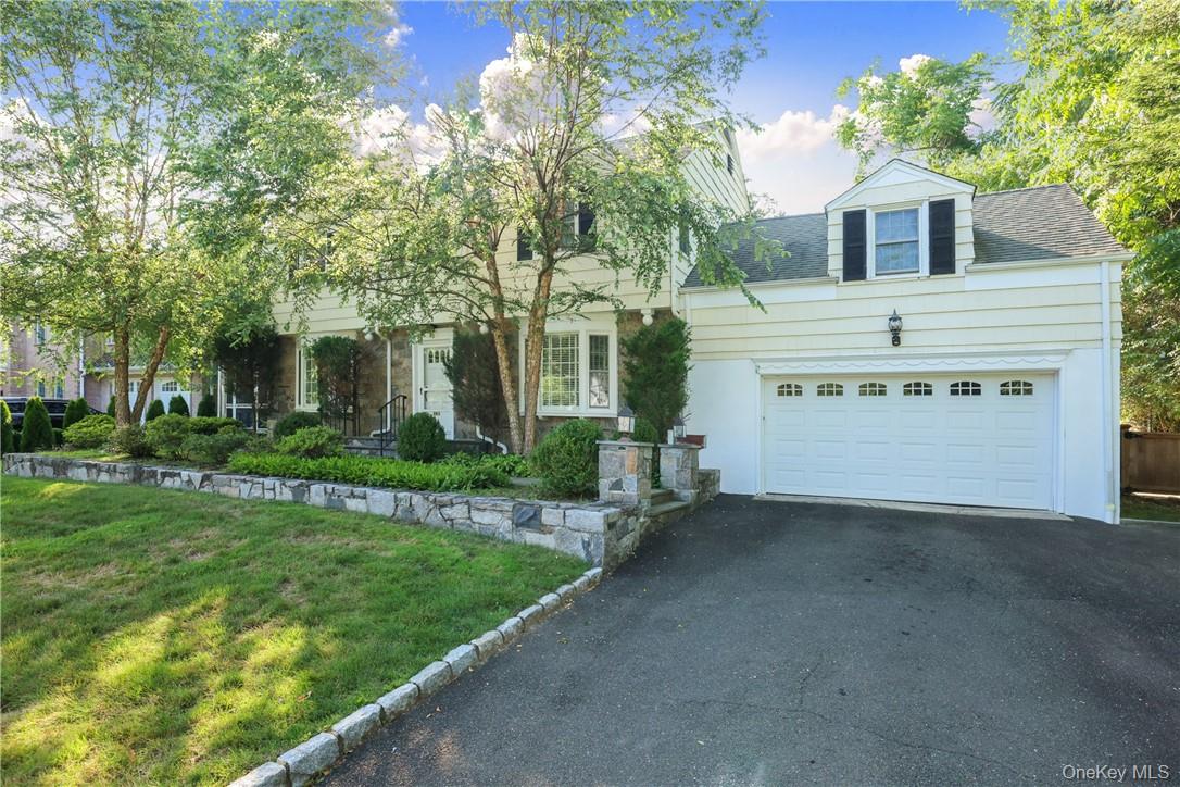 Great Colonial for rent in Scarsdale! The main level features a formal...