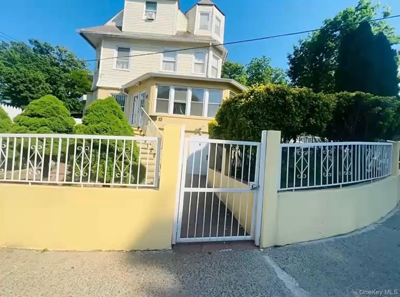 Welcome to 11-15 Landscape Avenue! This unique property includes two t...