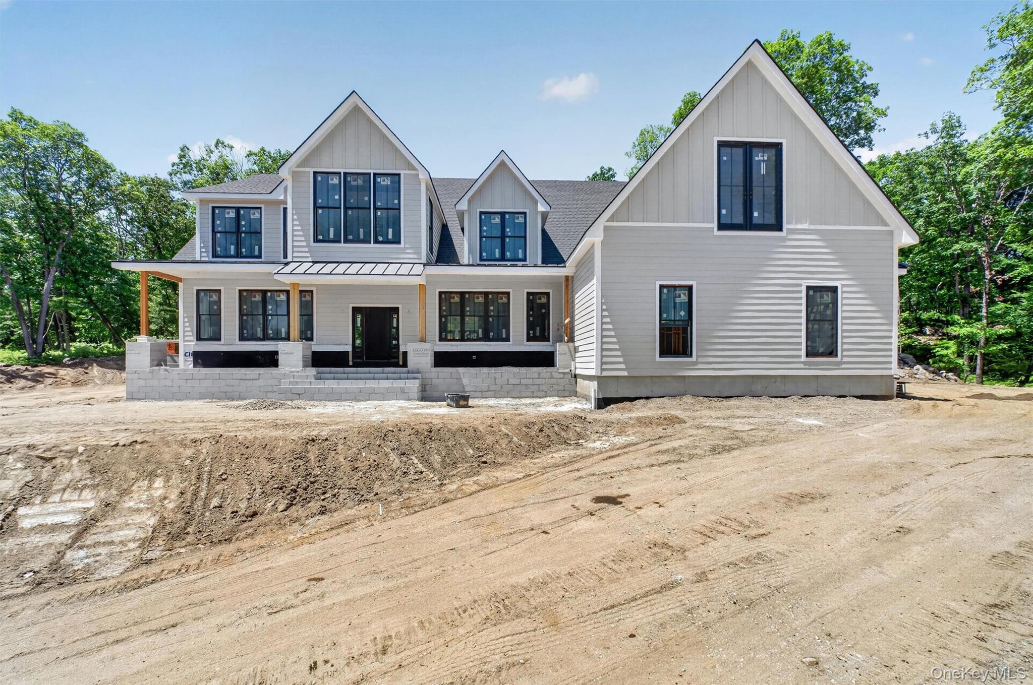 A Modern Farmhouse Estate Overlooking Protected Farmland at Cat Hill a...