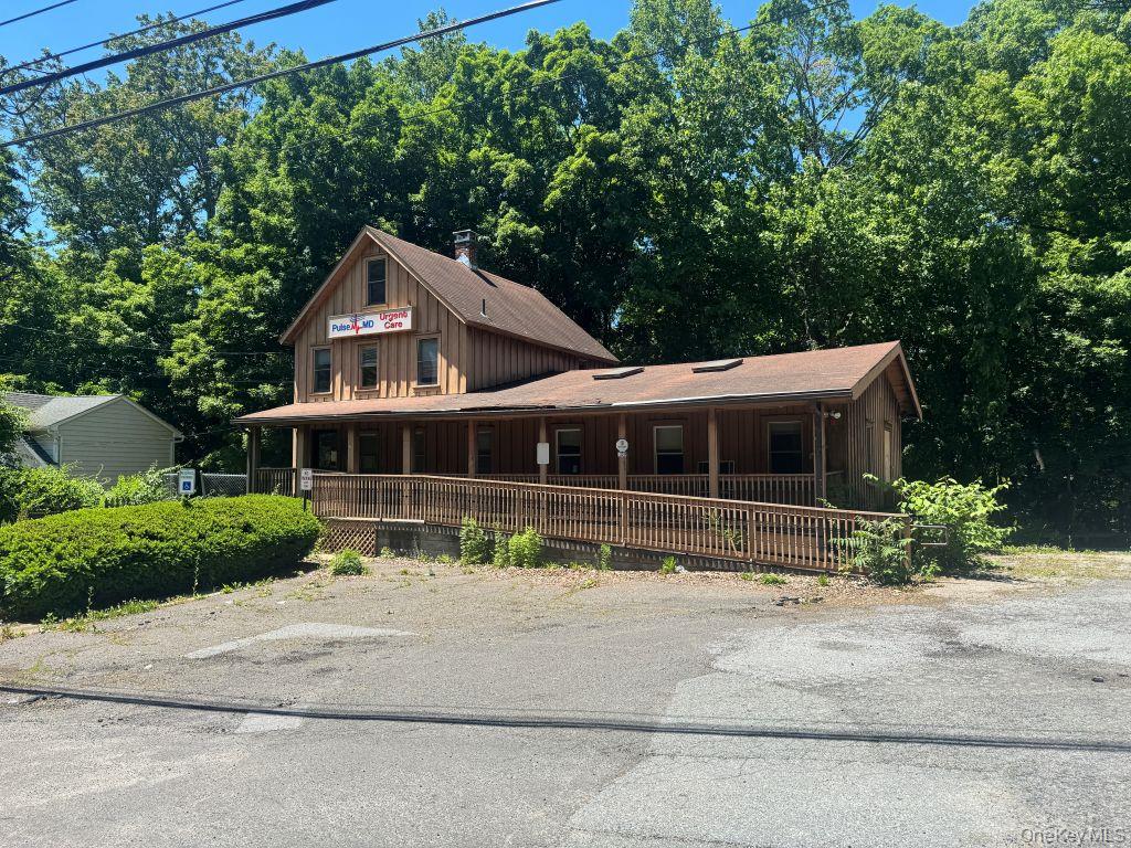 Great space for office or medical use! 2 stories and a basement, lots...