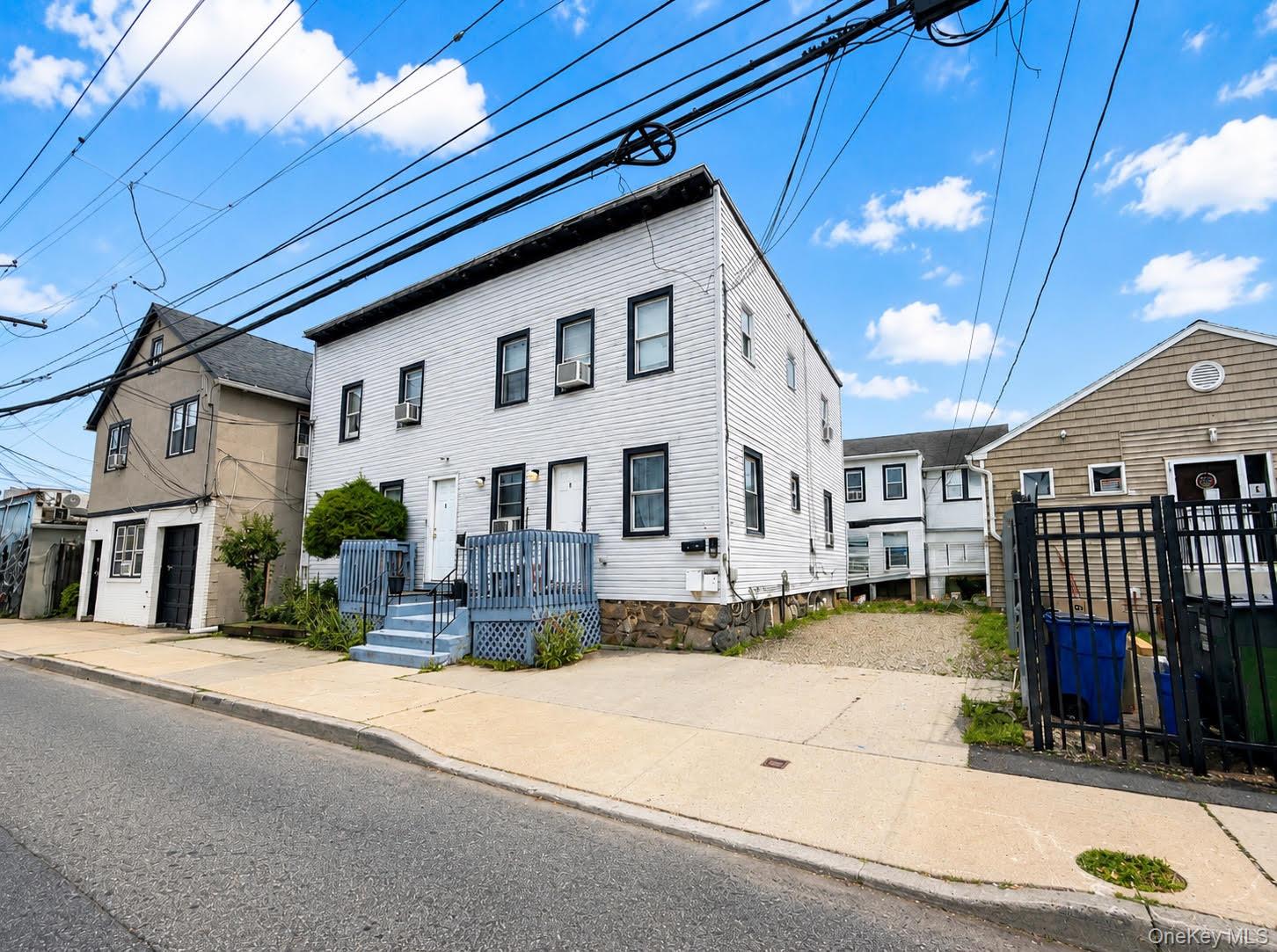 Rare FIVE-FAMILY family investment opportunity consisting of two separ...