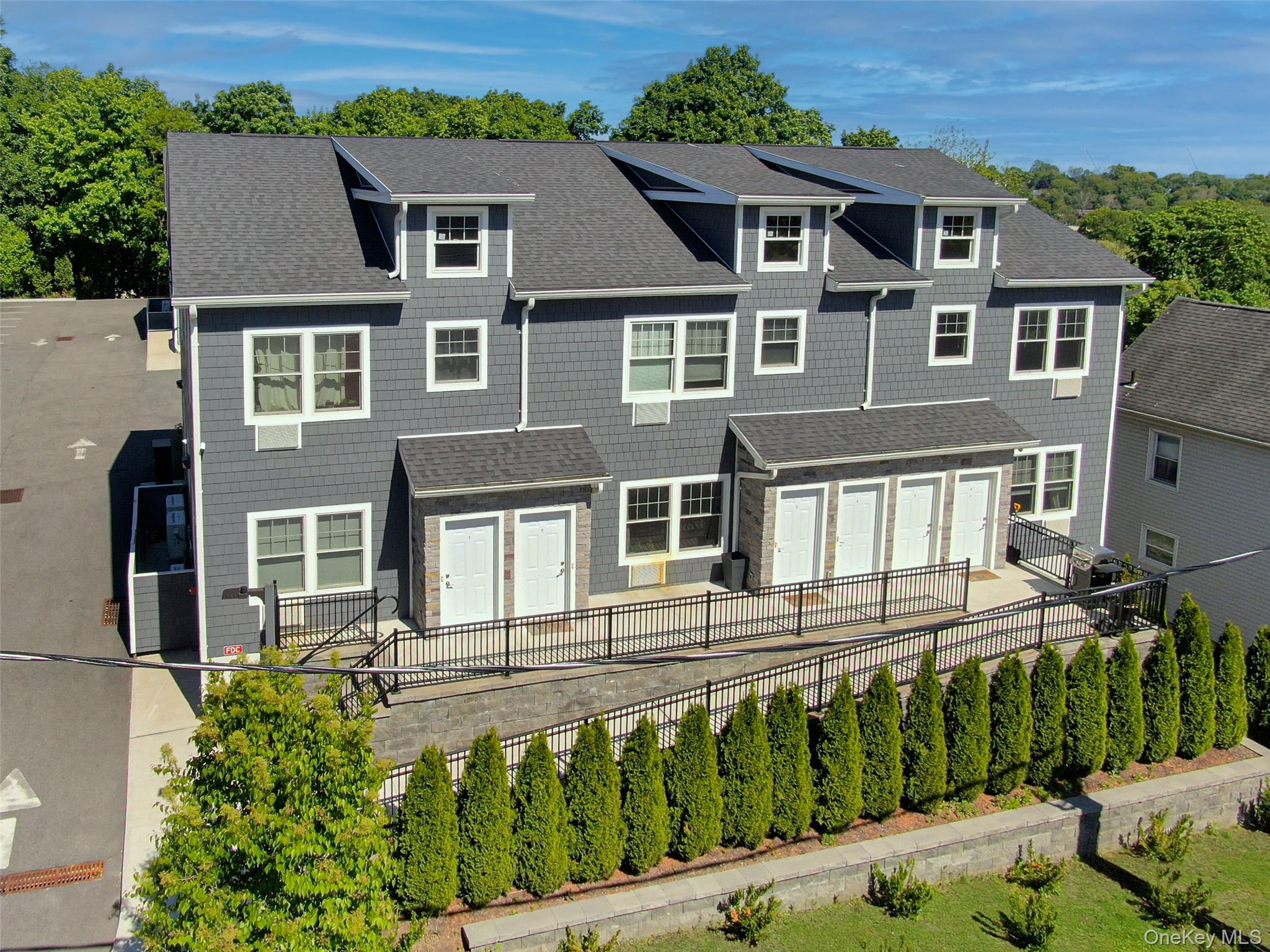 Experience modern living at Kensico Commons, a boutique luxury rental...