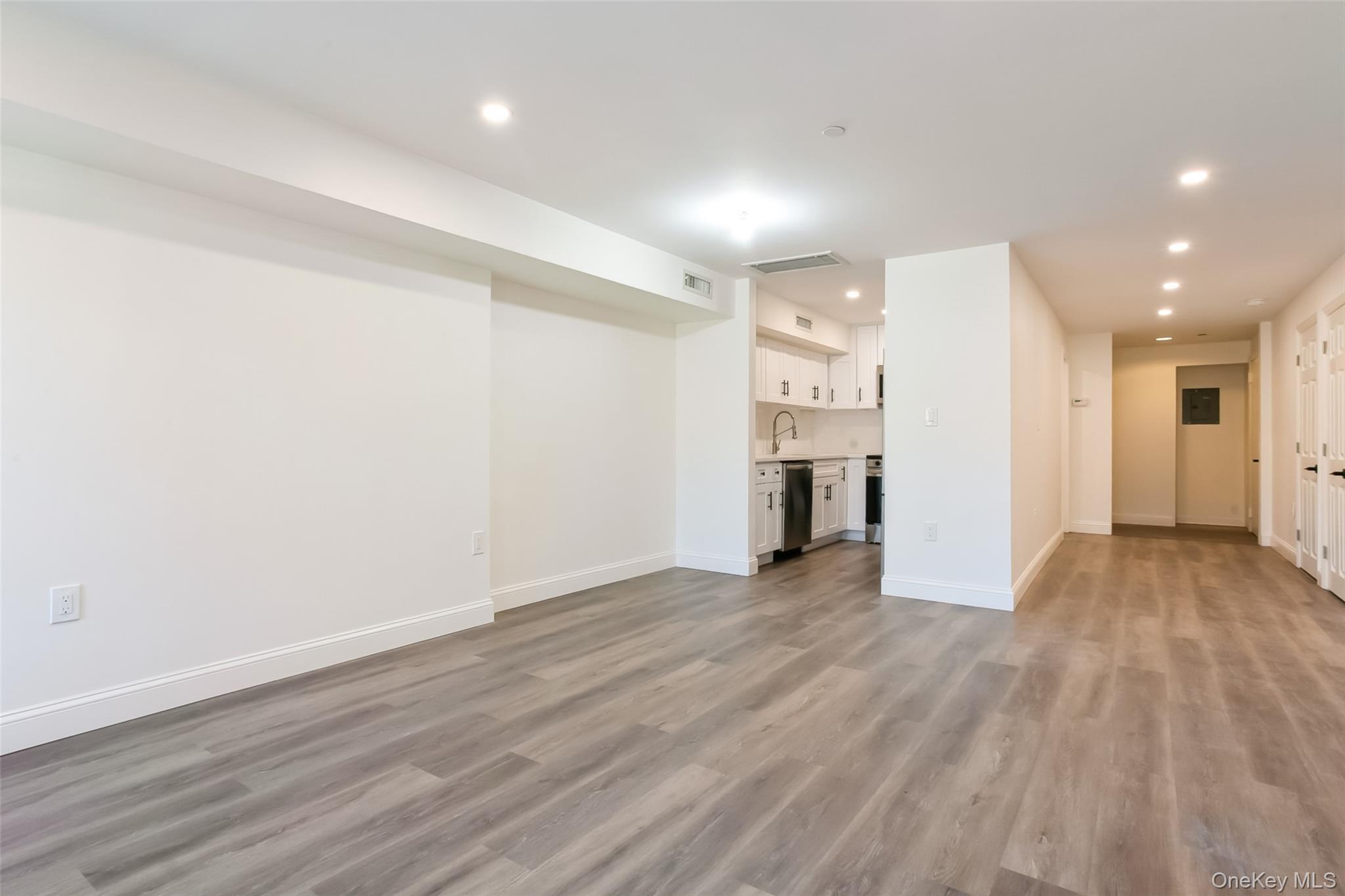 Bright and spacious one-bedroom apartment with an office and den in th...