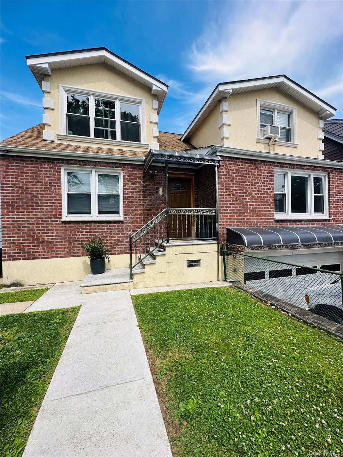 A beautifully renovated 3-bedroom, 1st-floor apartment featuring a was...