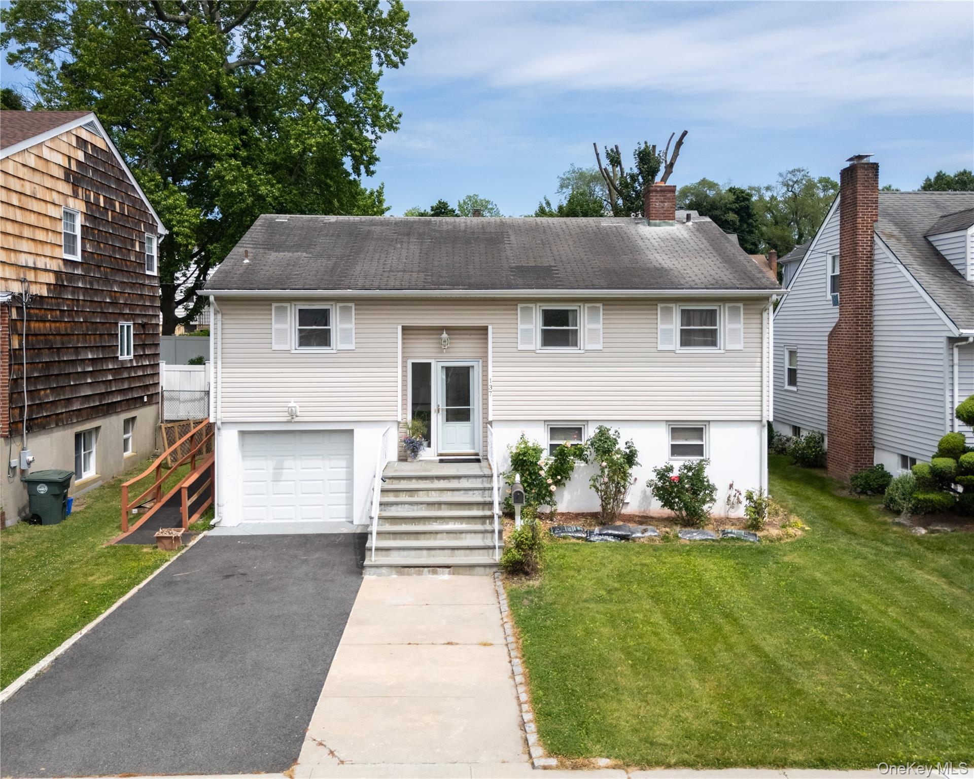 Raised Ranch om .12- acre lot.  Home offers open floor plan. Kitchen,...