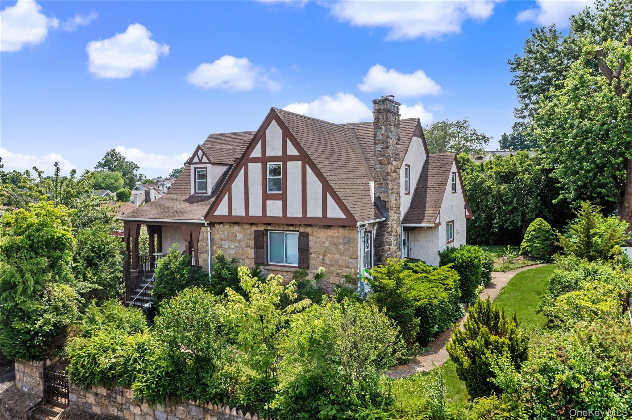 Welcome to this beautiful two-family home in Yonkers, offering an outs...