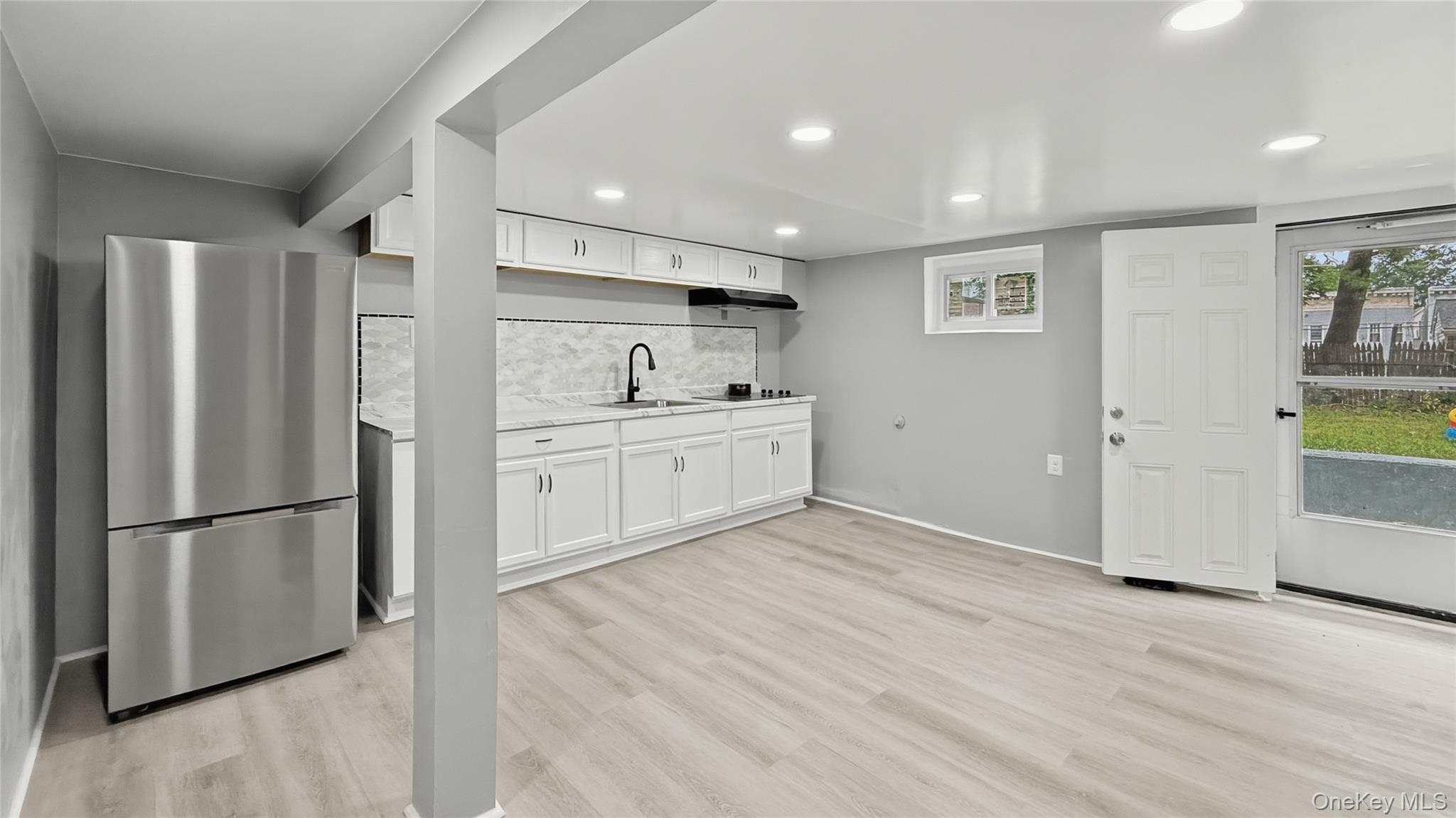 Newly renovated One Bedroom walkout in a treelined block. Close to tra...