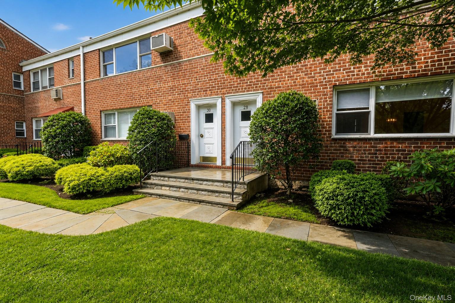 Welcome to 28 Oregon Avenue, Unit A, a bright and inviting first-floor...