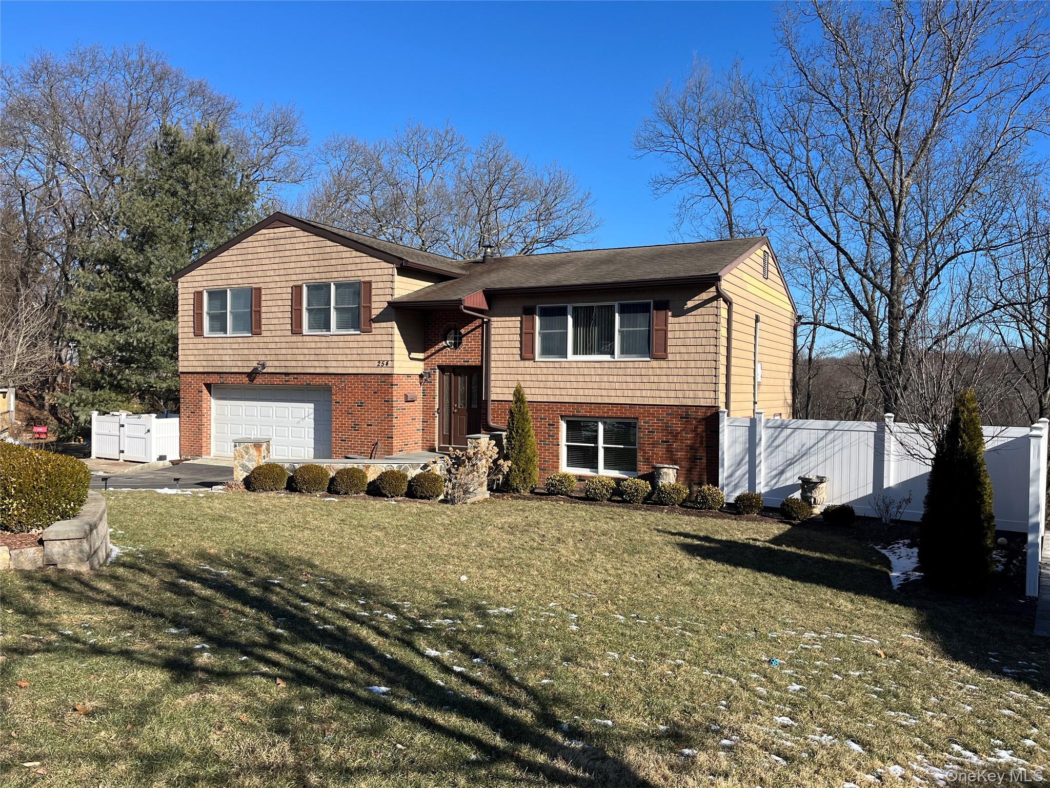 Exceptional Raised Ranch Split-Level with Private In-Law Suite & Endle...
