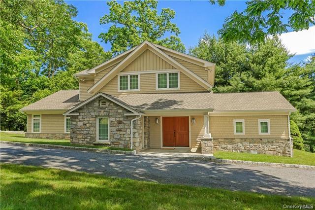 Completely move-in ready, renovated home with first floor primary suit...