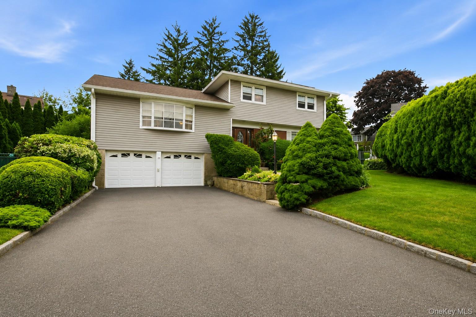 Nestled on a quiet cul-de-sac in one of Scarsdale's most desirable nei...