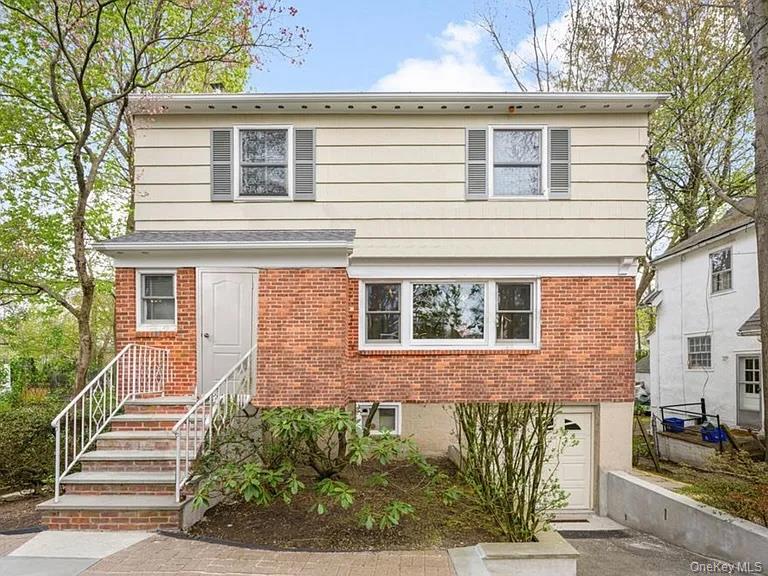 Move right in and enjoy summertime in Larchmont from this comfortable,...
