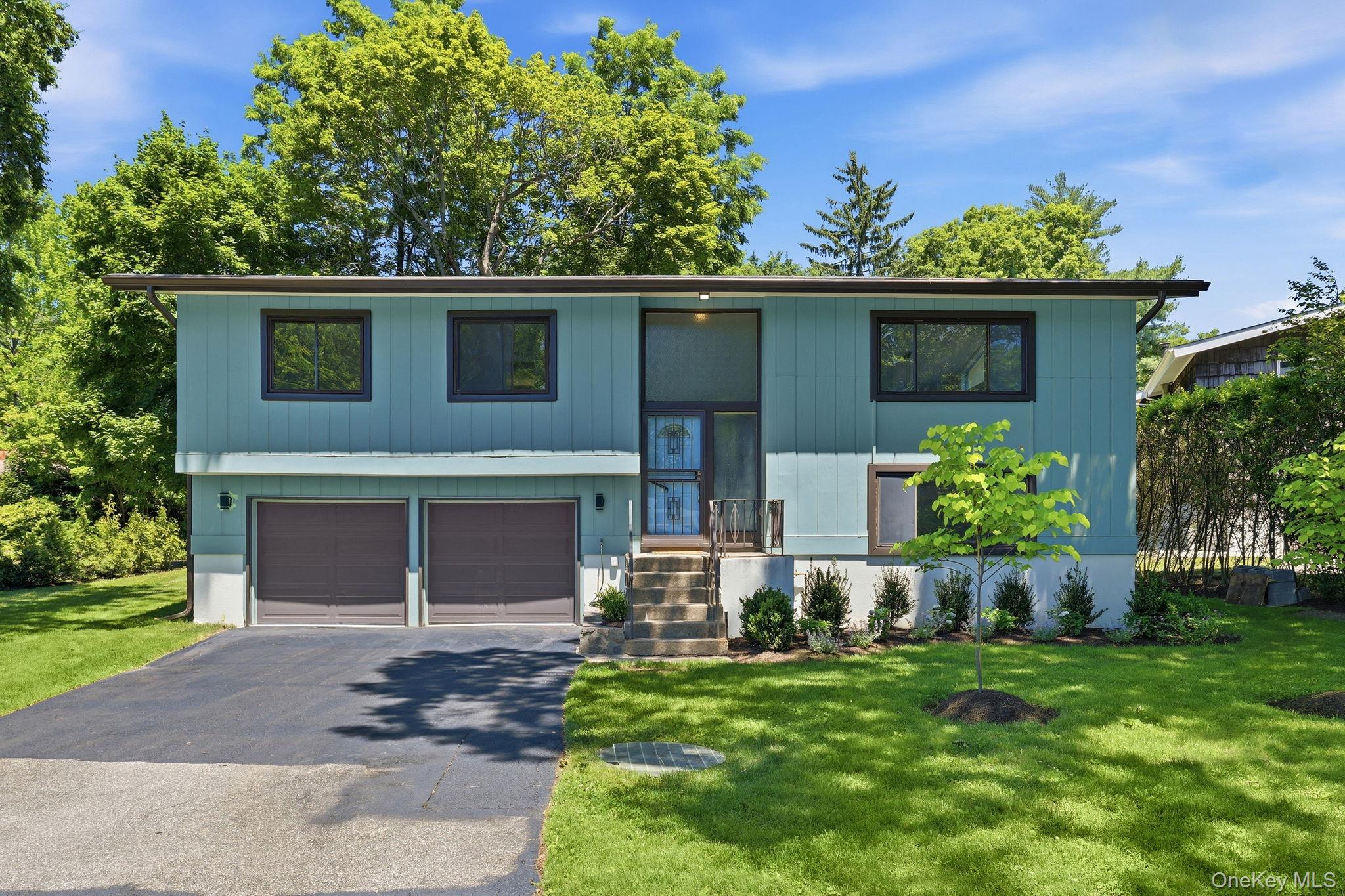 Beautifully renovated and reimagined, this sun-filled Contemporary Rai...