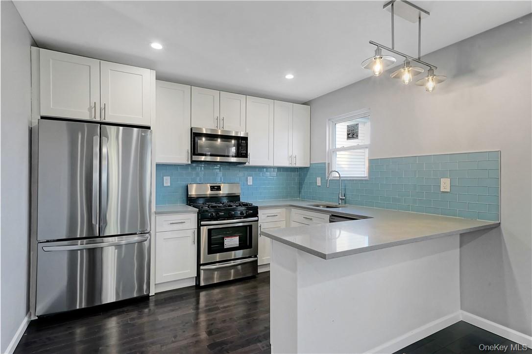 Welcome to 115 Washington Street! This spacious duplex offers 3 bedroo...