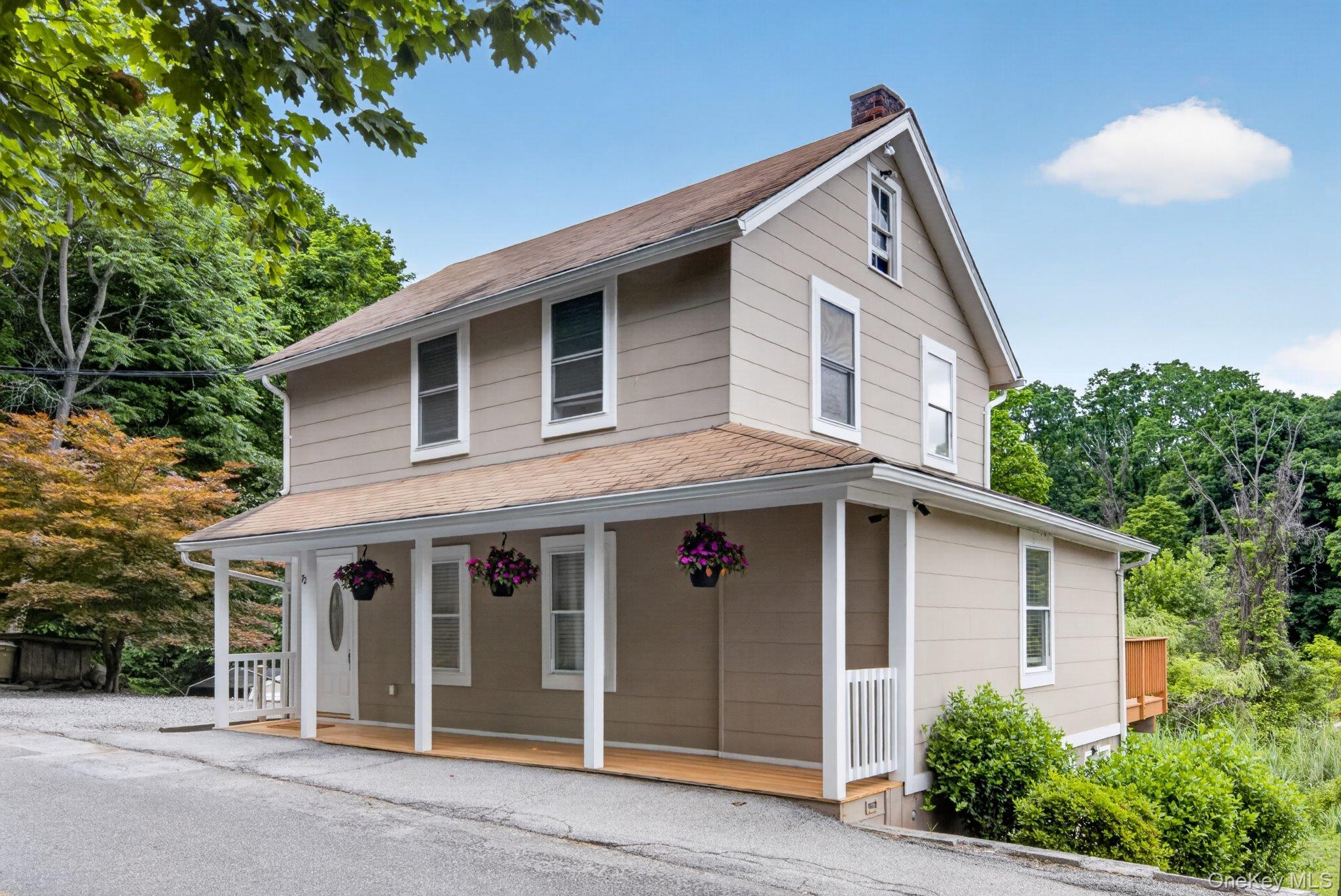 Charming front porch Colonial ideally located just 5 minutes to the Co...