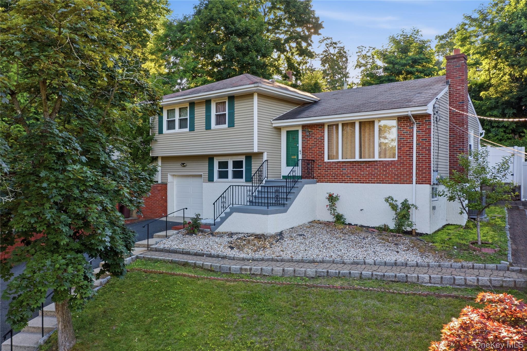 This charming split level home is nestled on a quiet cul-de- sac. The...