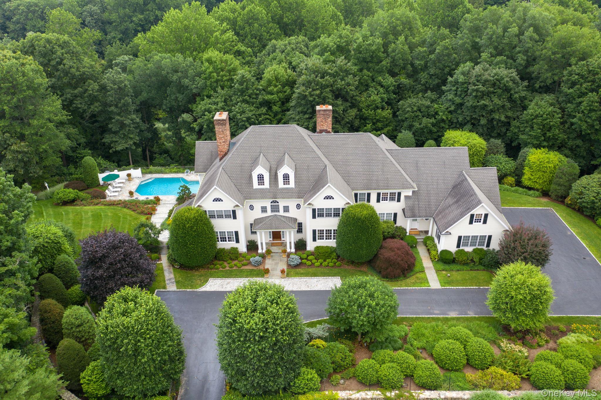 Exceptional Georgian Colonial elegance meets private resort living on...