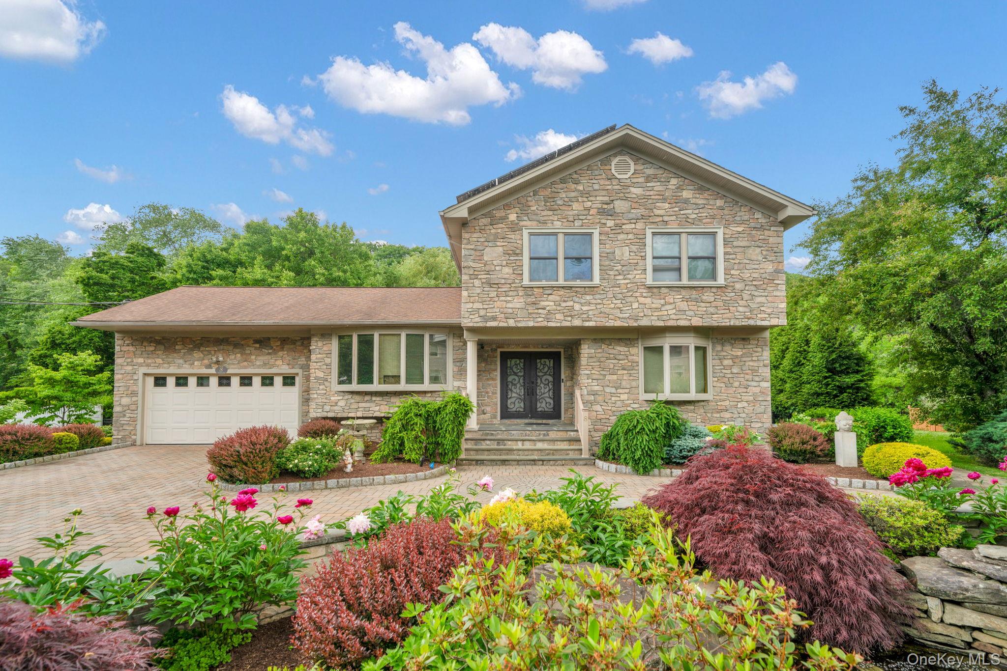 Look no further, gorgeous move in ready  stone split level sitting on...