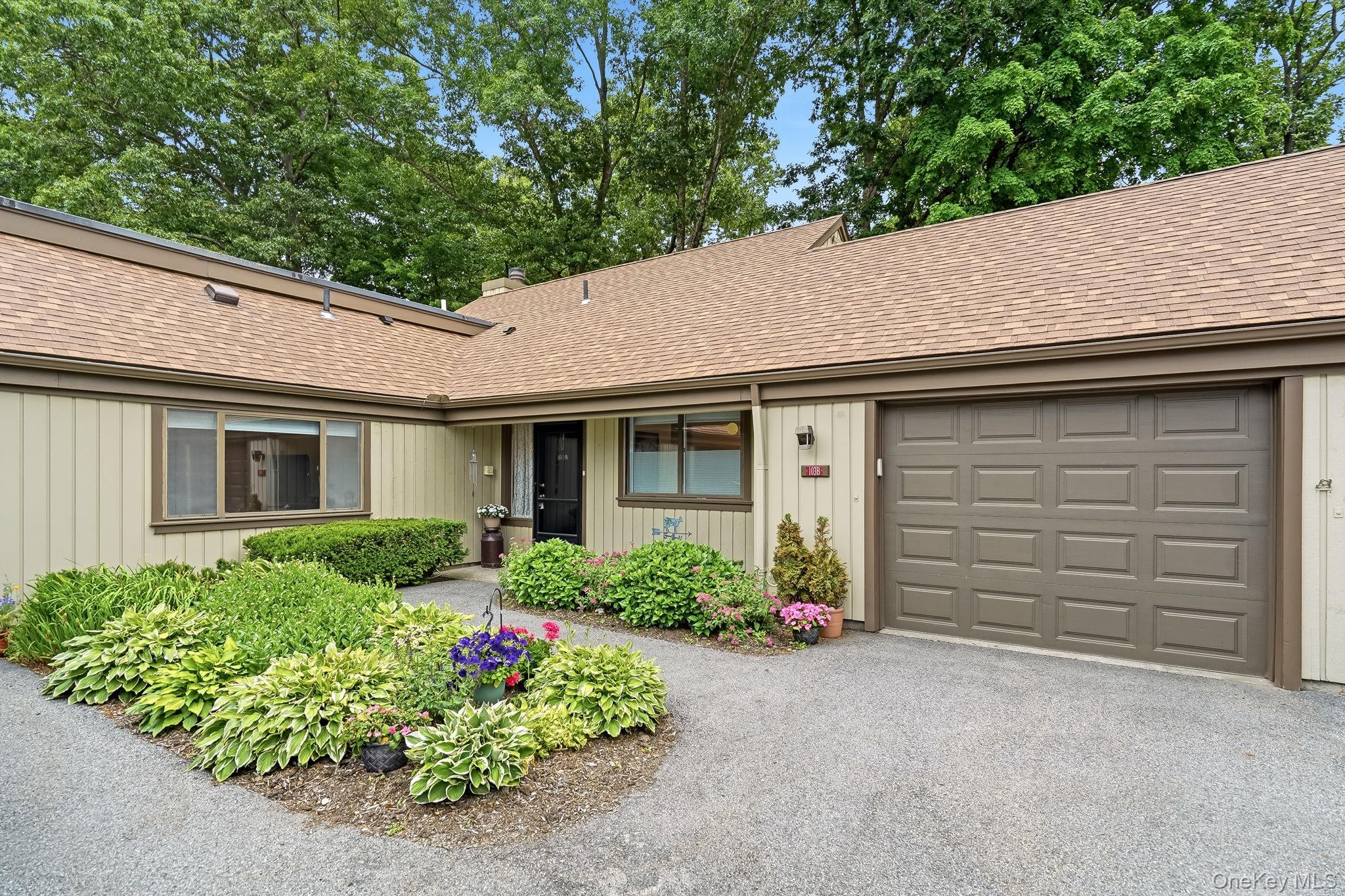 Carefree one-level living condominium living awaits in this privately...