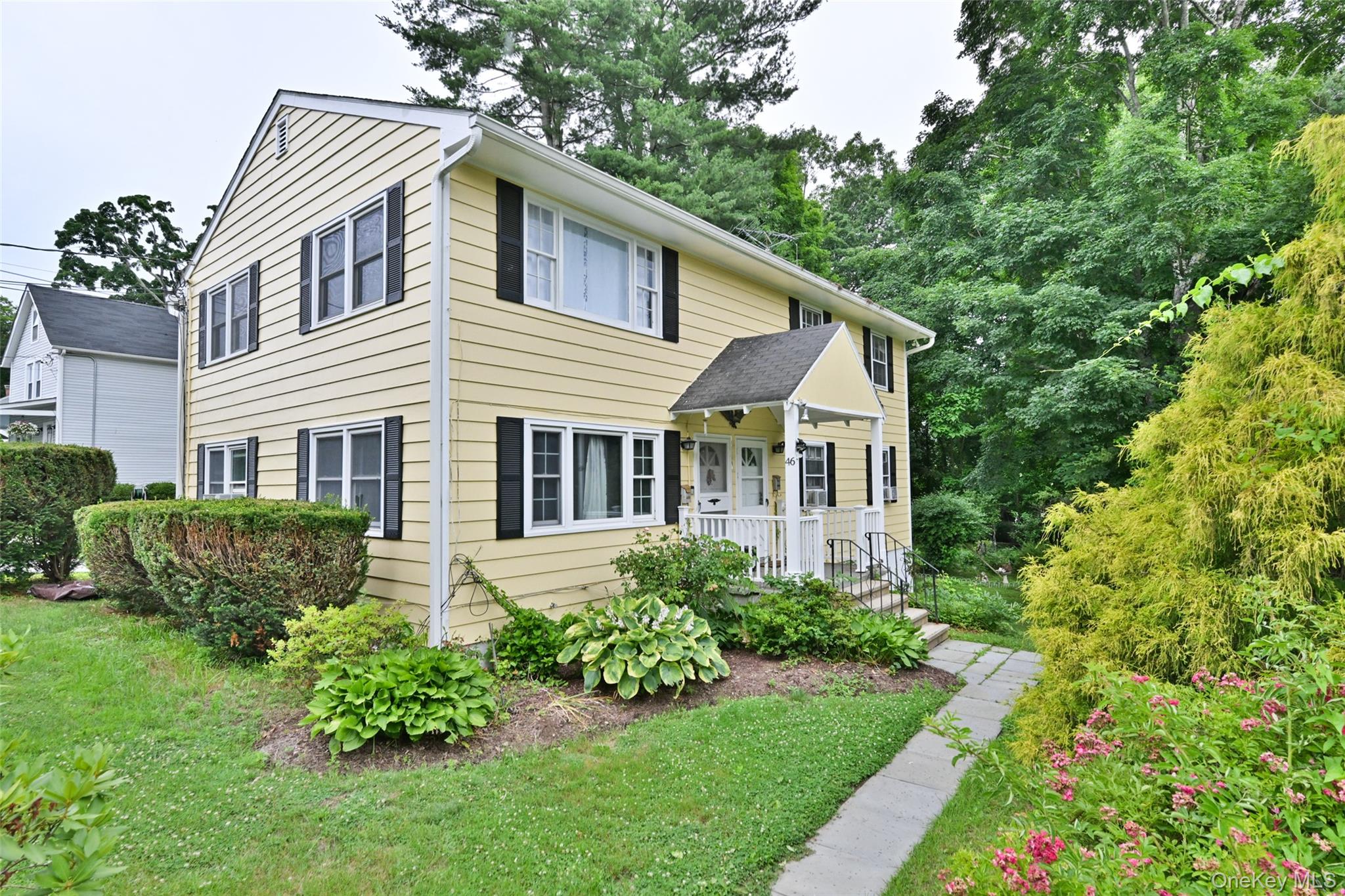 Move right into this beautifully renovated, sun-filled second-floor ap...