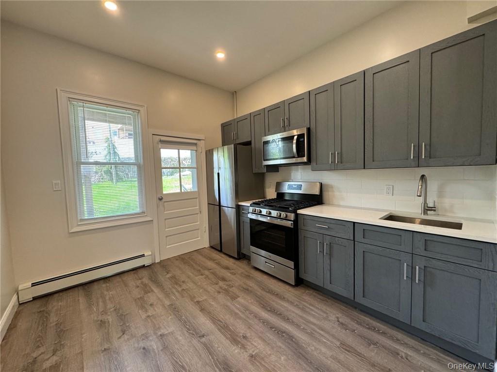 Experience luxury living in the heart of Harrison with this newly reno...