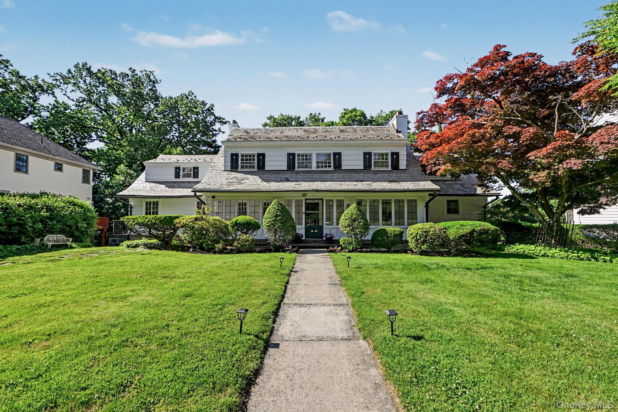 This spacious Dutch colonial home is located on a coveted street in an...