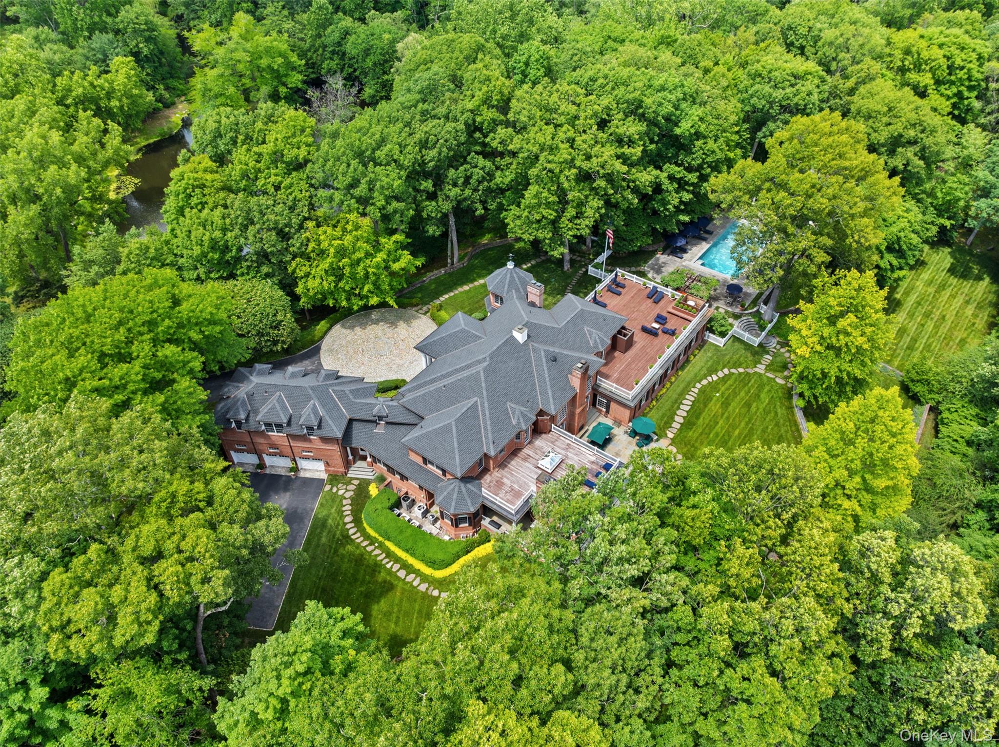 Welcome to 24 Trails End, an unparalleled private resort estate redefi...