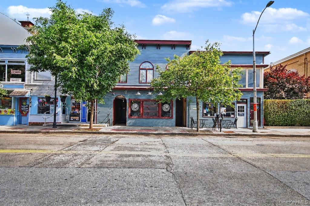 Welcome to 911 South Street, a rare mixed-use commercial multiple buil...