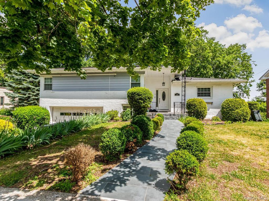 Welcome to 126 Lasalle Drive, a beautifully maintained split-level hom...