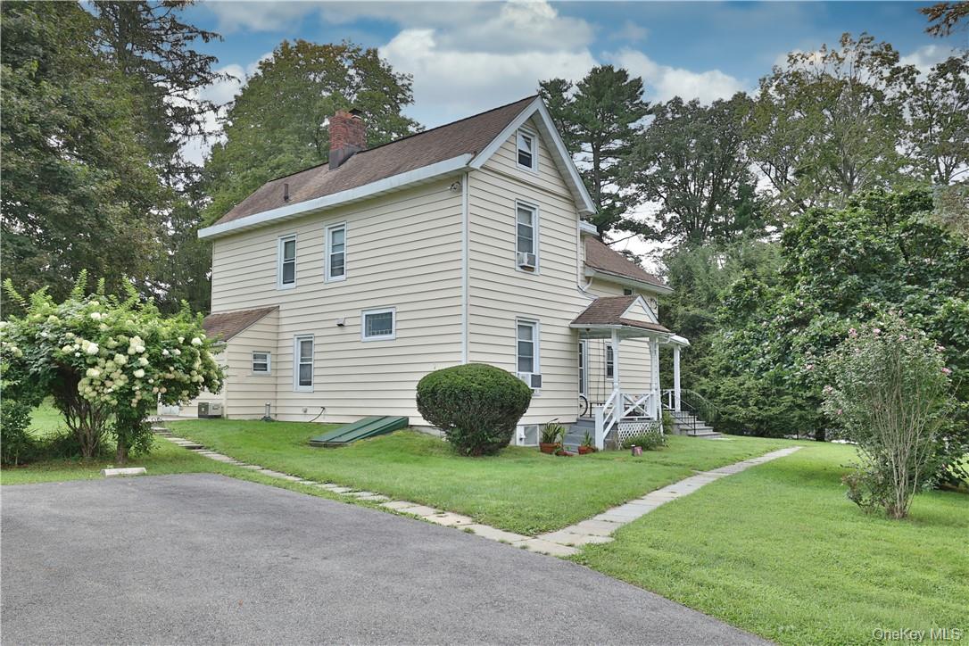Charming Village Rental with outdoor space in Chappaqua! Step into the...