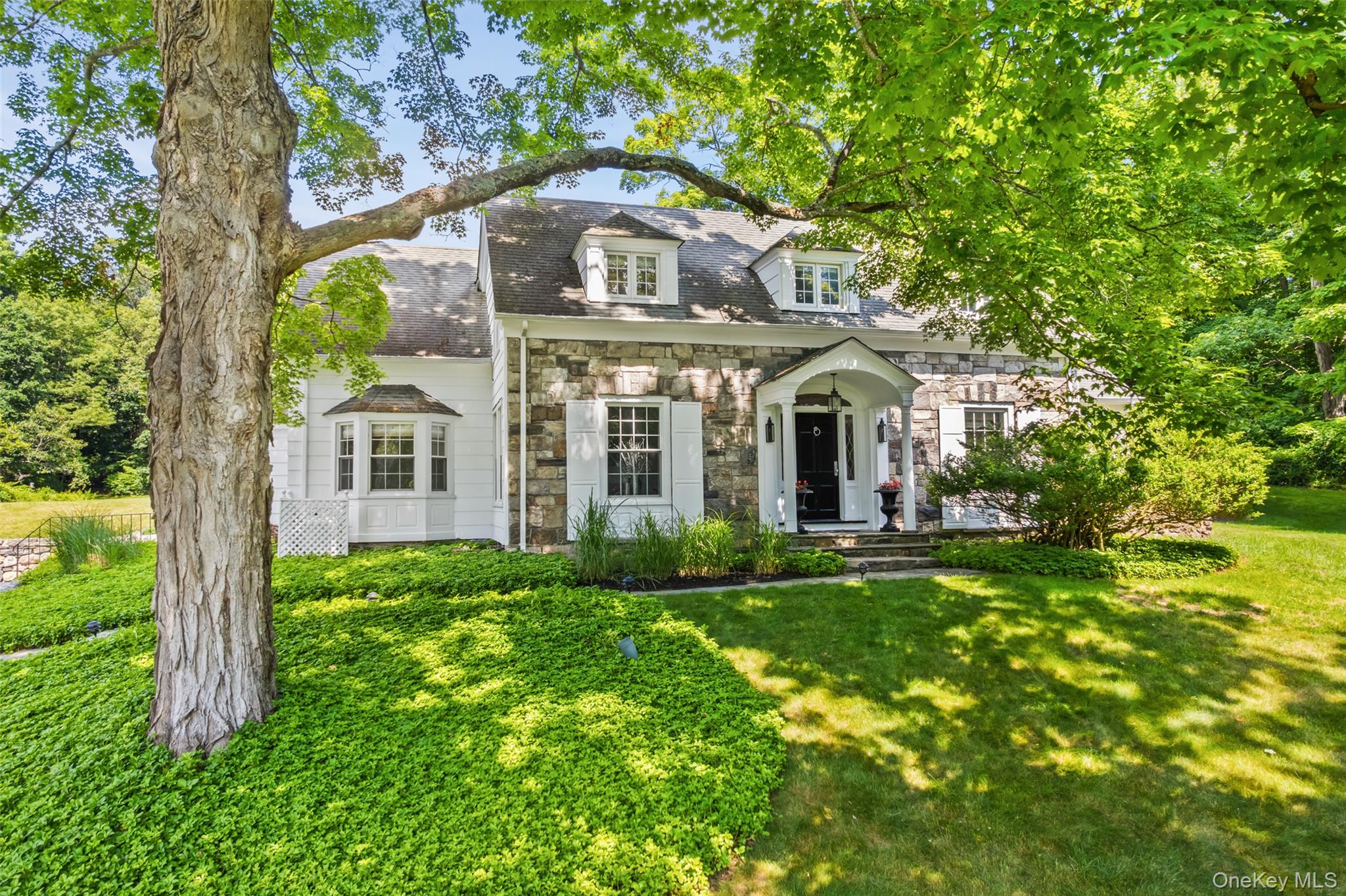 Gracious Country Colonial!  Originally built in 1932 and thoughtfully...